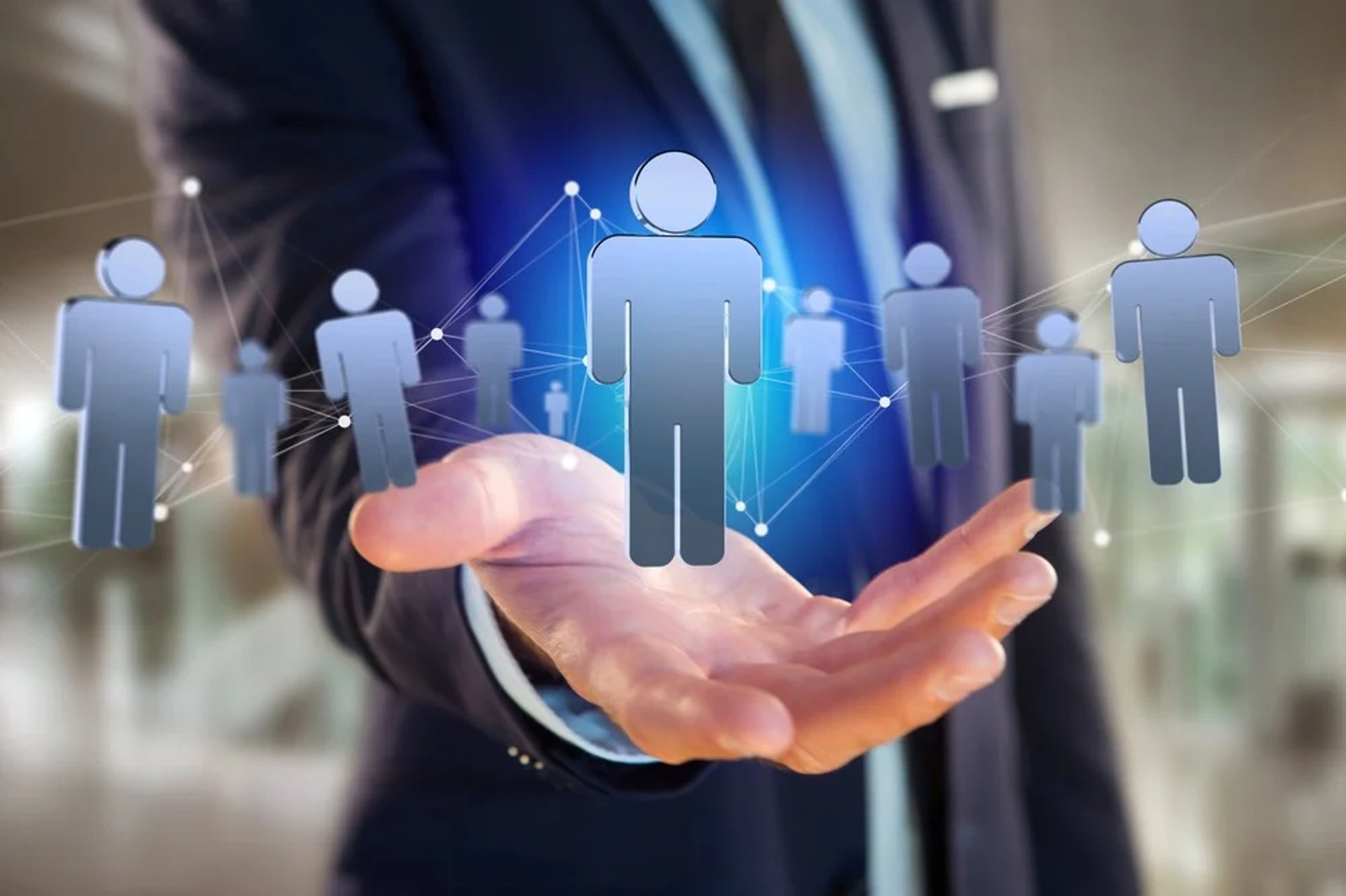 person in black long sleeve shirt holding persons hand