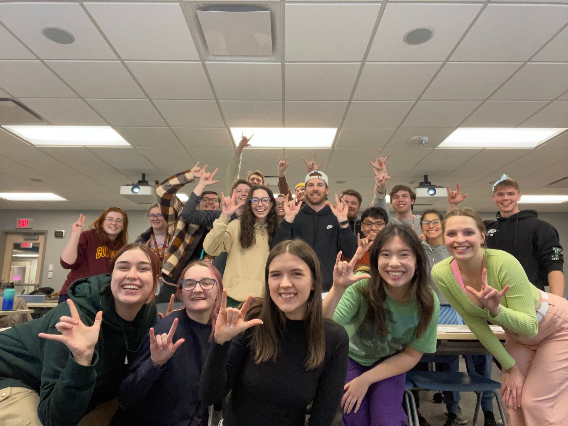 an abstract photo of a curved building with a blue sky in the background