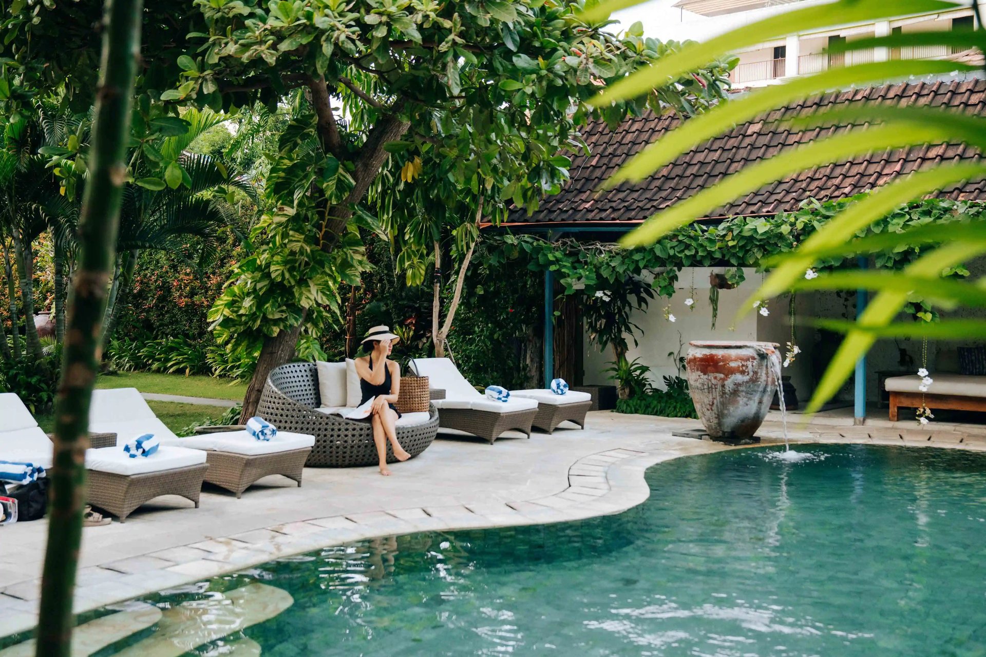 an abstract photo of a curved building with a blue sky in the background