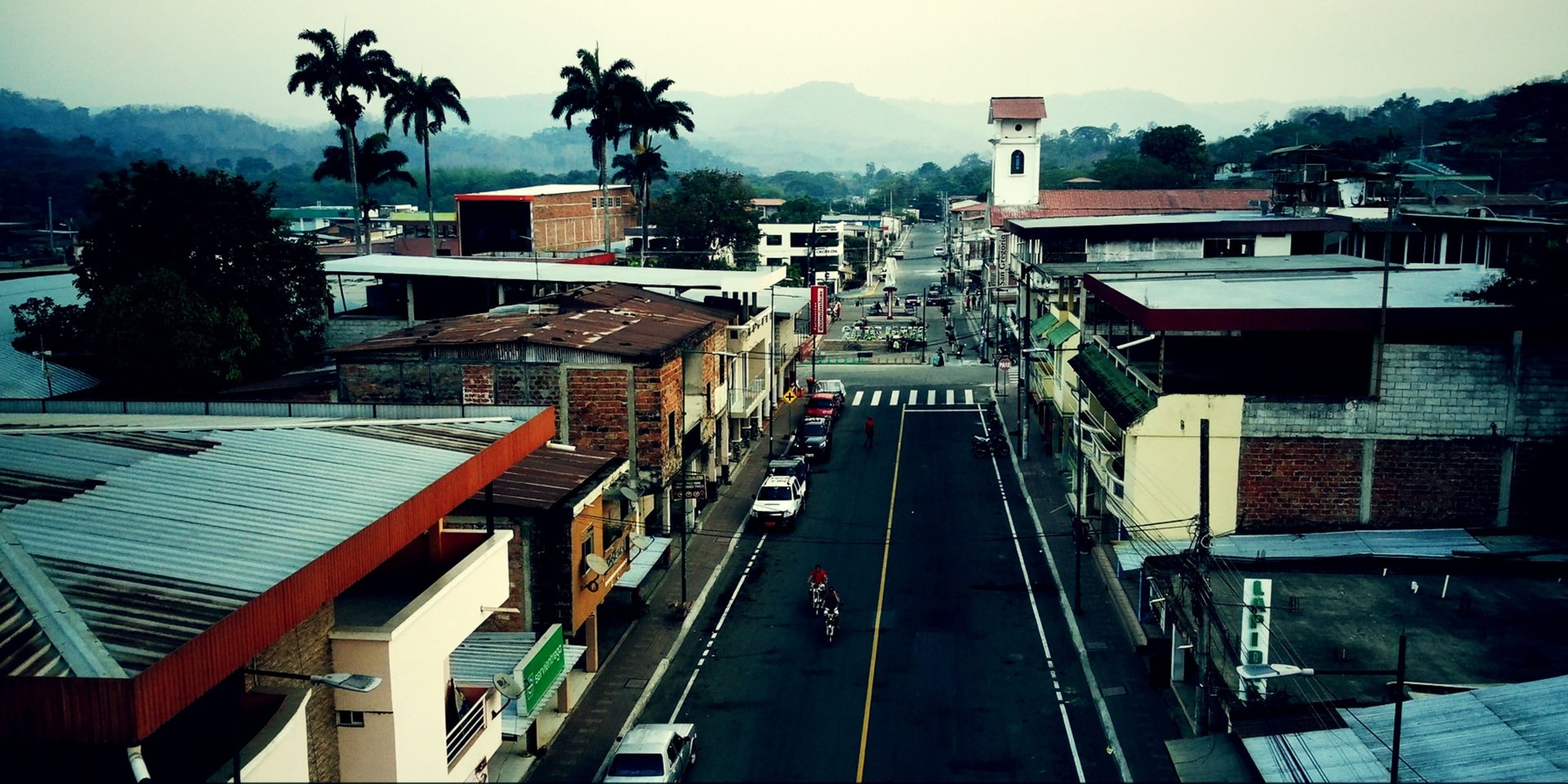 black and brown leather padded tub sofa