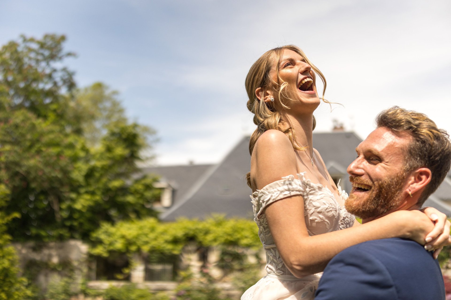 an abstract photo of a curved building with a blue sky in the background