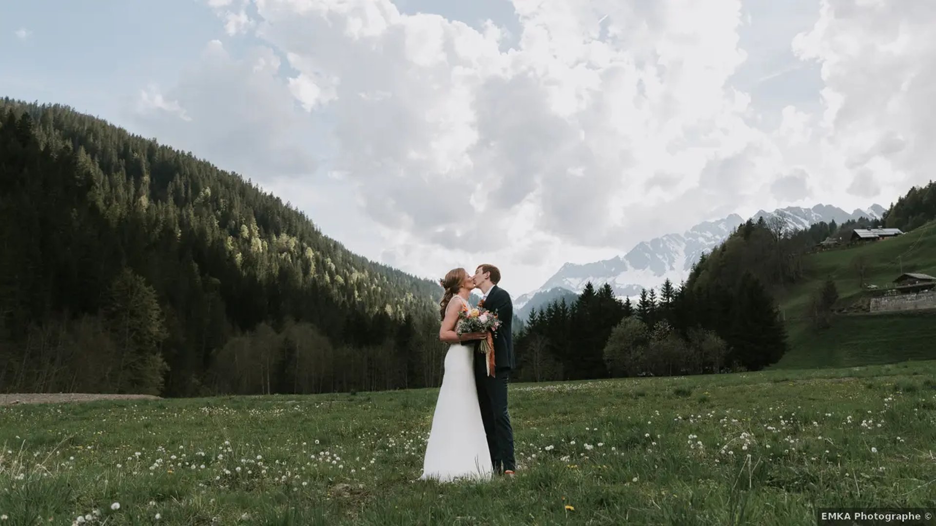an abstract photo of a curved building with a blue sky in the background