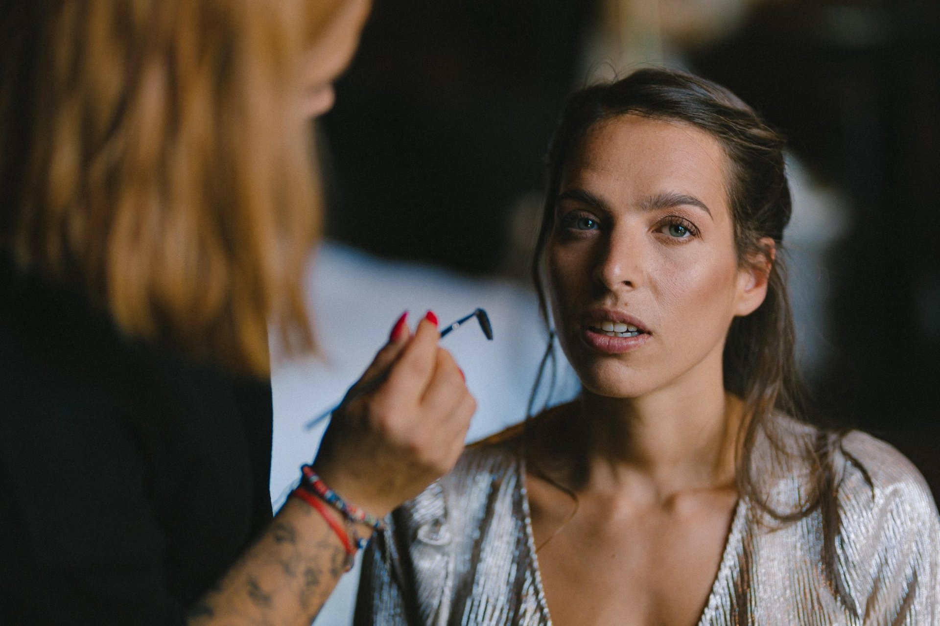 an abstract photo of a curved building with a blue sky in the background