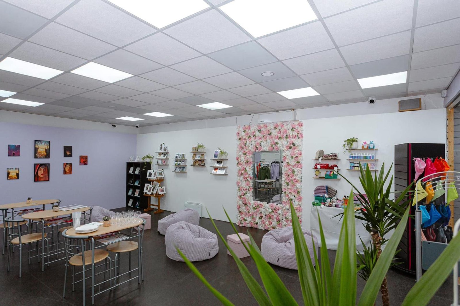 an abstract photo of a curved building with a blue sky in the background
