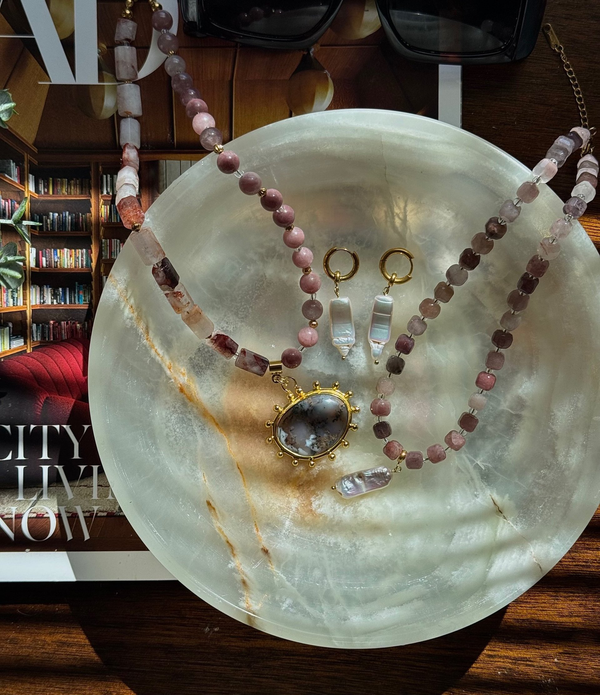 person wearing grey knit sweater