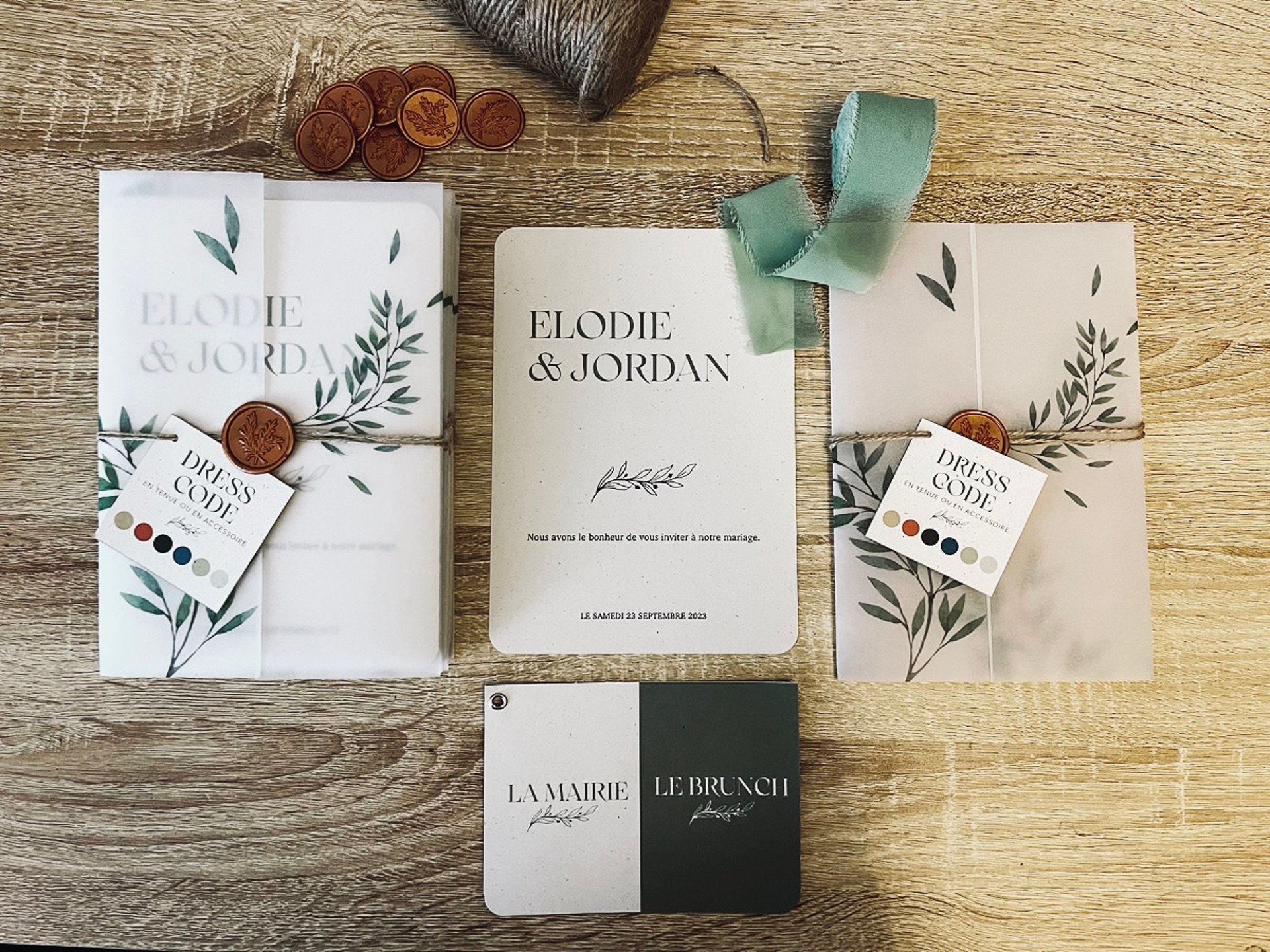 baby covered with white blanket