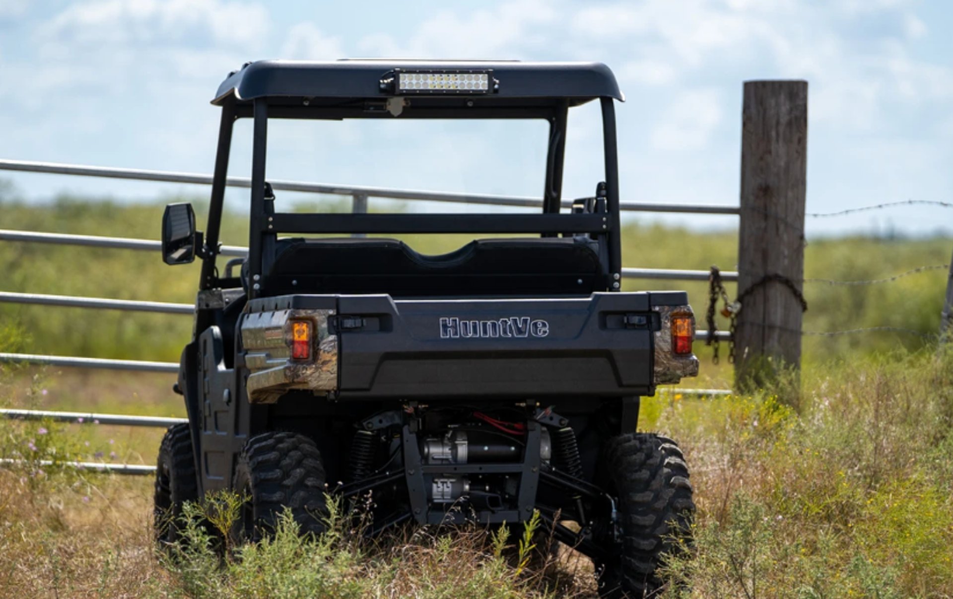 huntve utv parked outside a gate