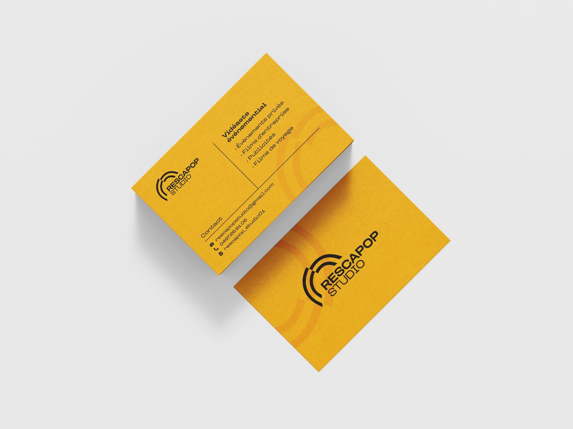 an abstract photo of a curved building with a blue sky in the background