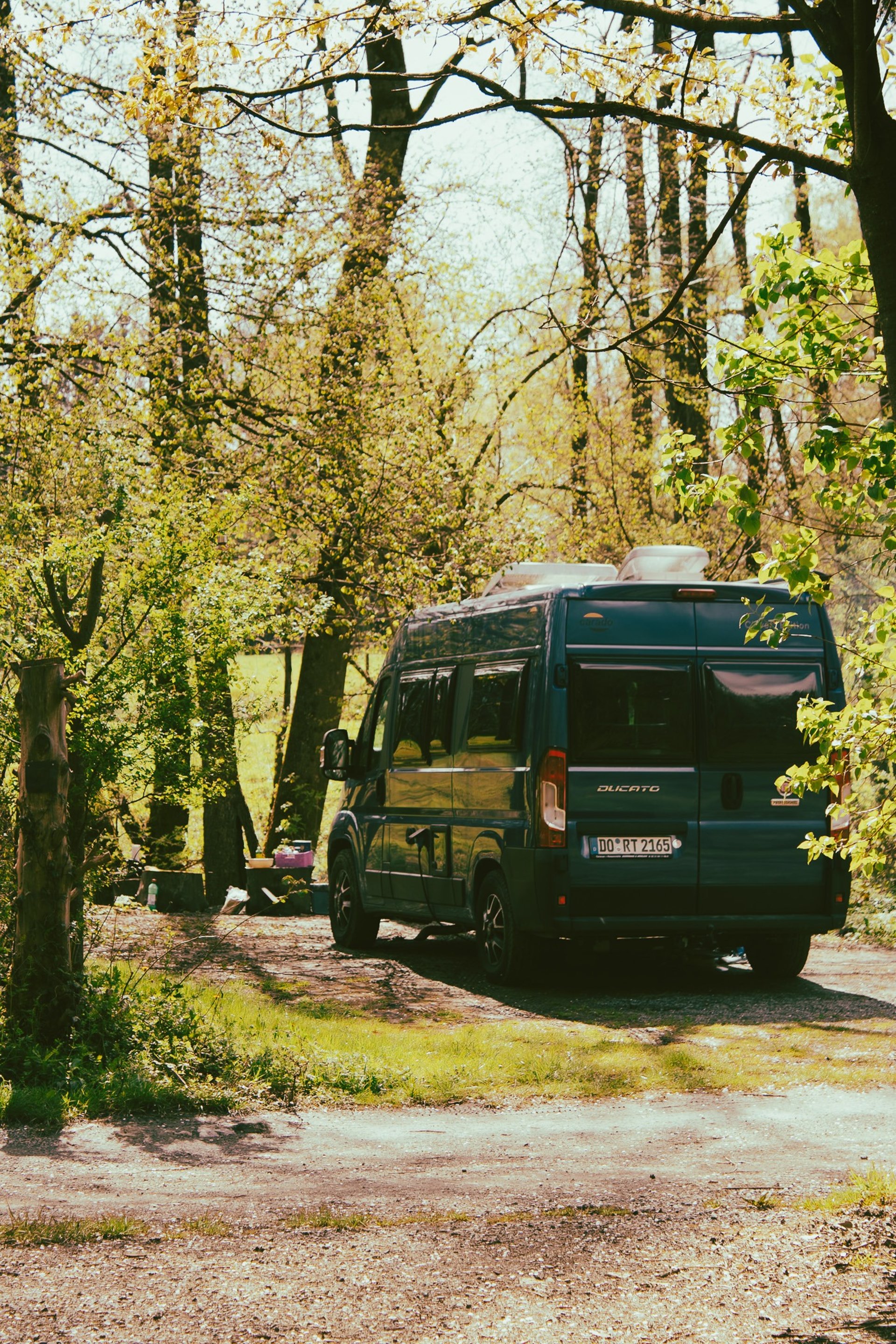 an abstract photo of a curved building with a blue sky in the background