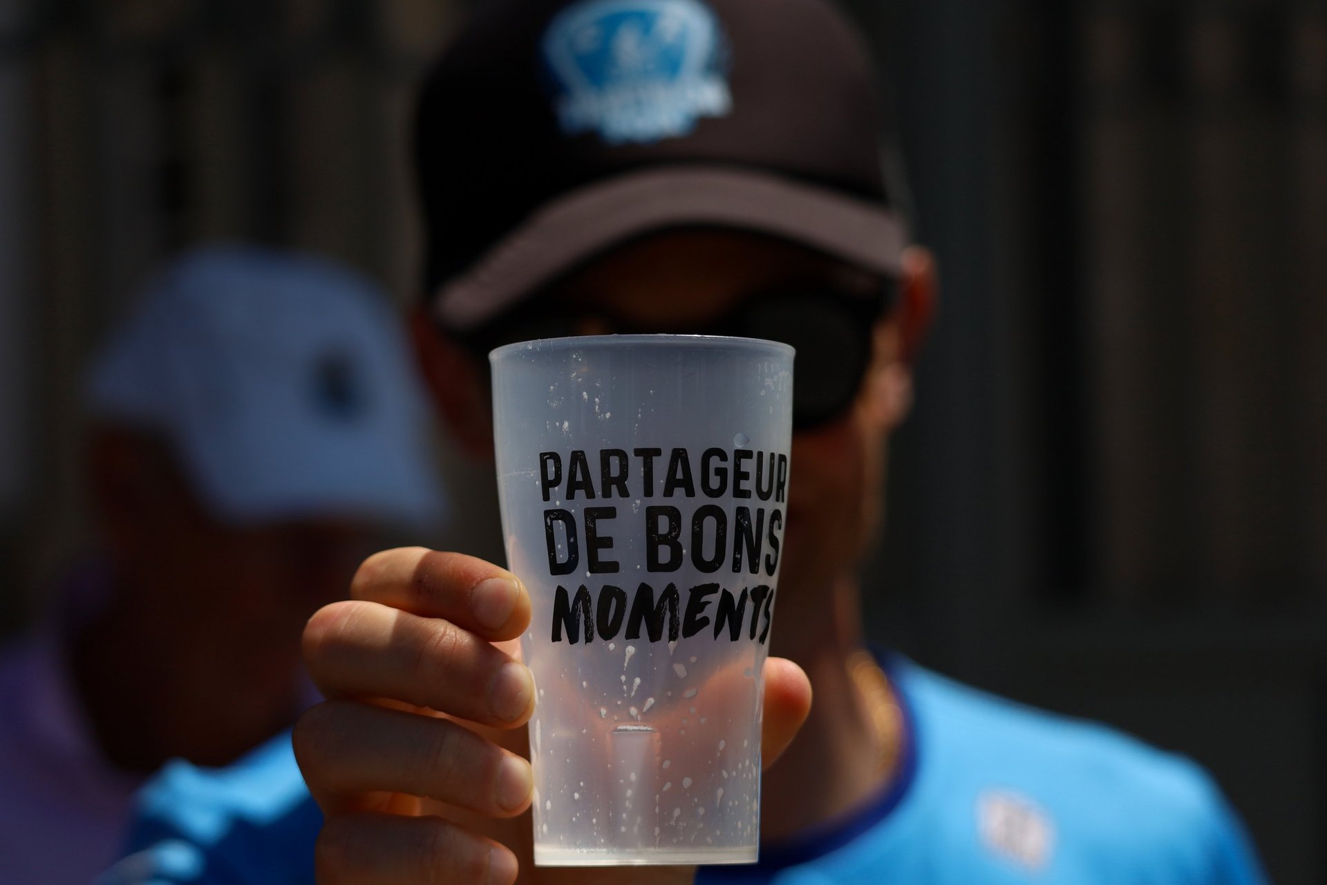 woman wearing yellow long-sleeved dress under white clouds and blue sky during daytime