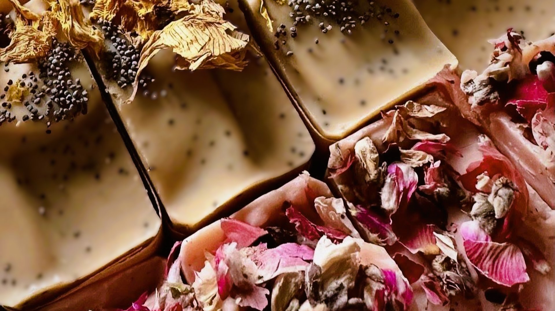 a pile of different colored soaps sitting on top of each other