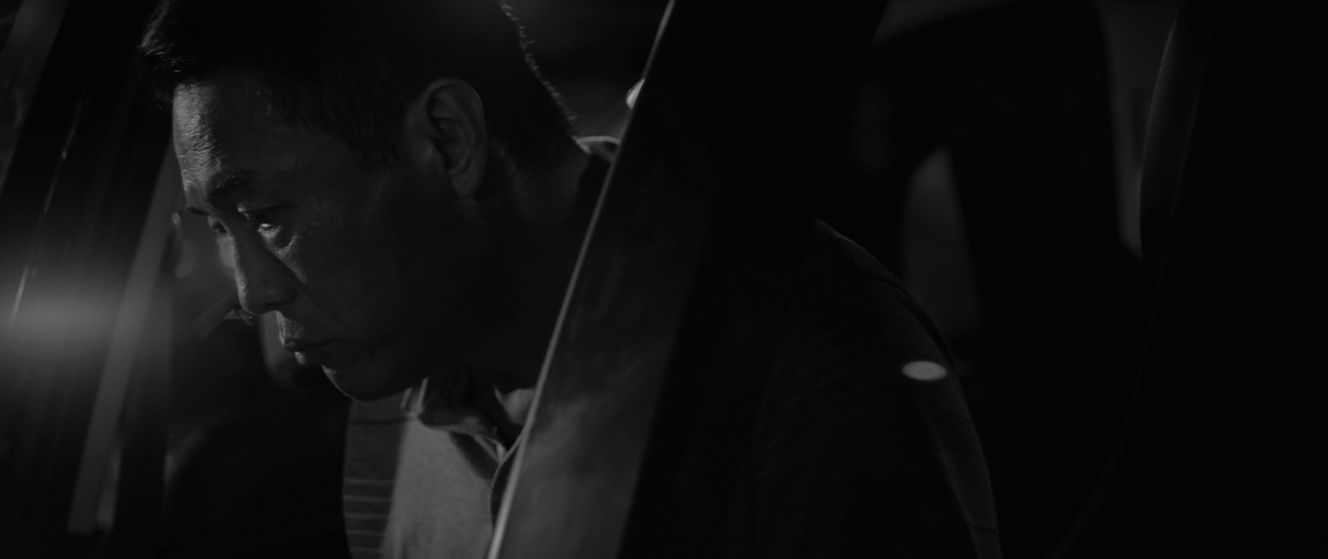black textile on brown wooden table