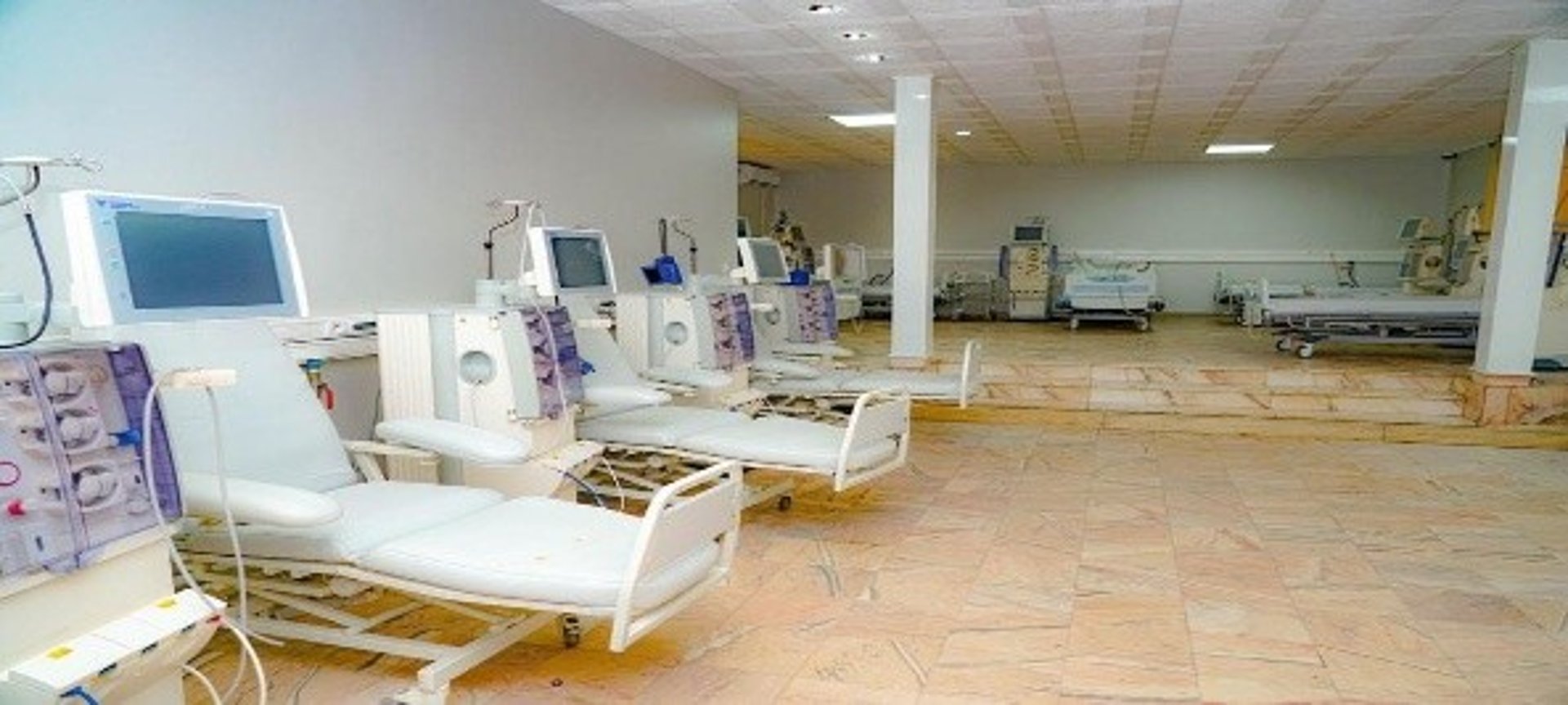 woman wearing yellow long-sleeved dress under white clouds and blue sky during daytime