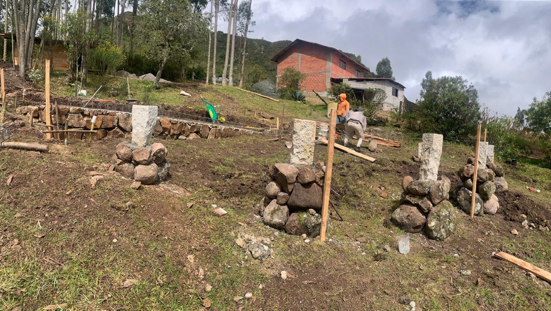 woman wearing yellow long-sleeved dress under white clouds and blue sky during daytime