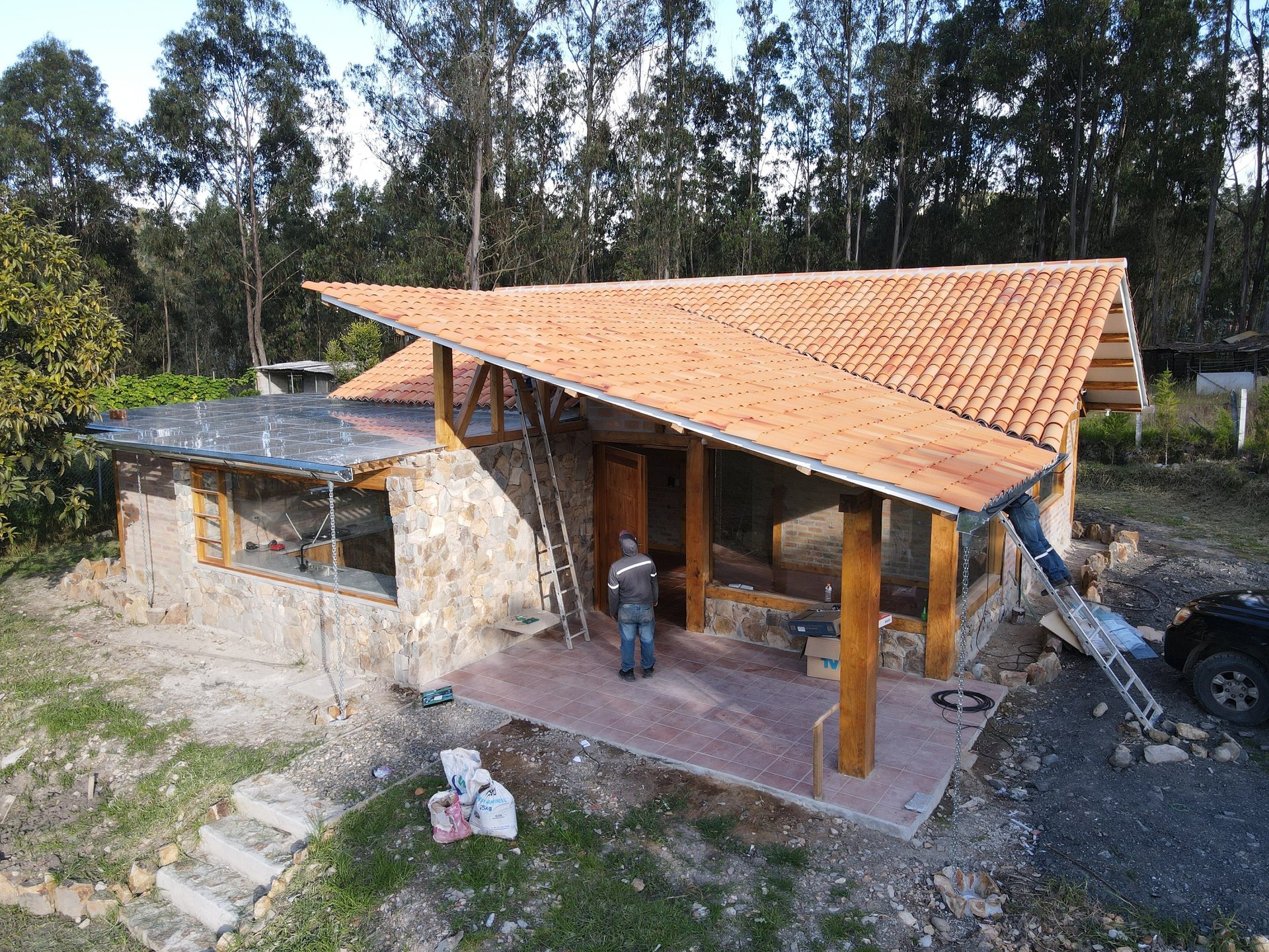 black and brown leather padded tub sofa