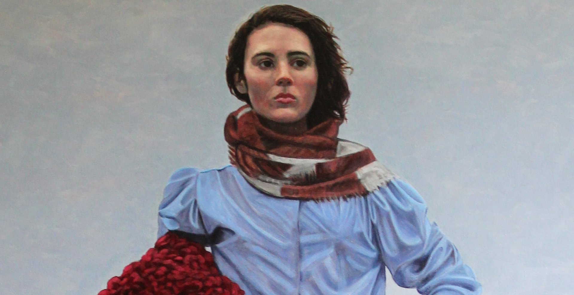 an abstract photo of a curved building with a blue sky in the background