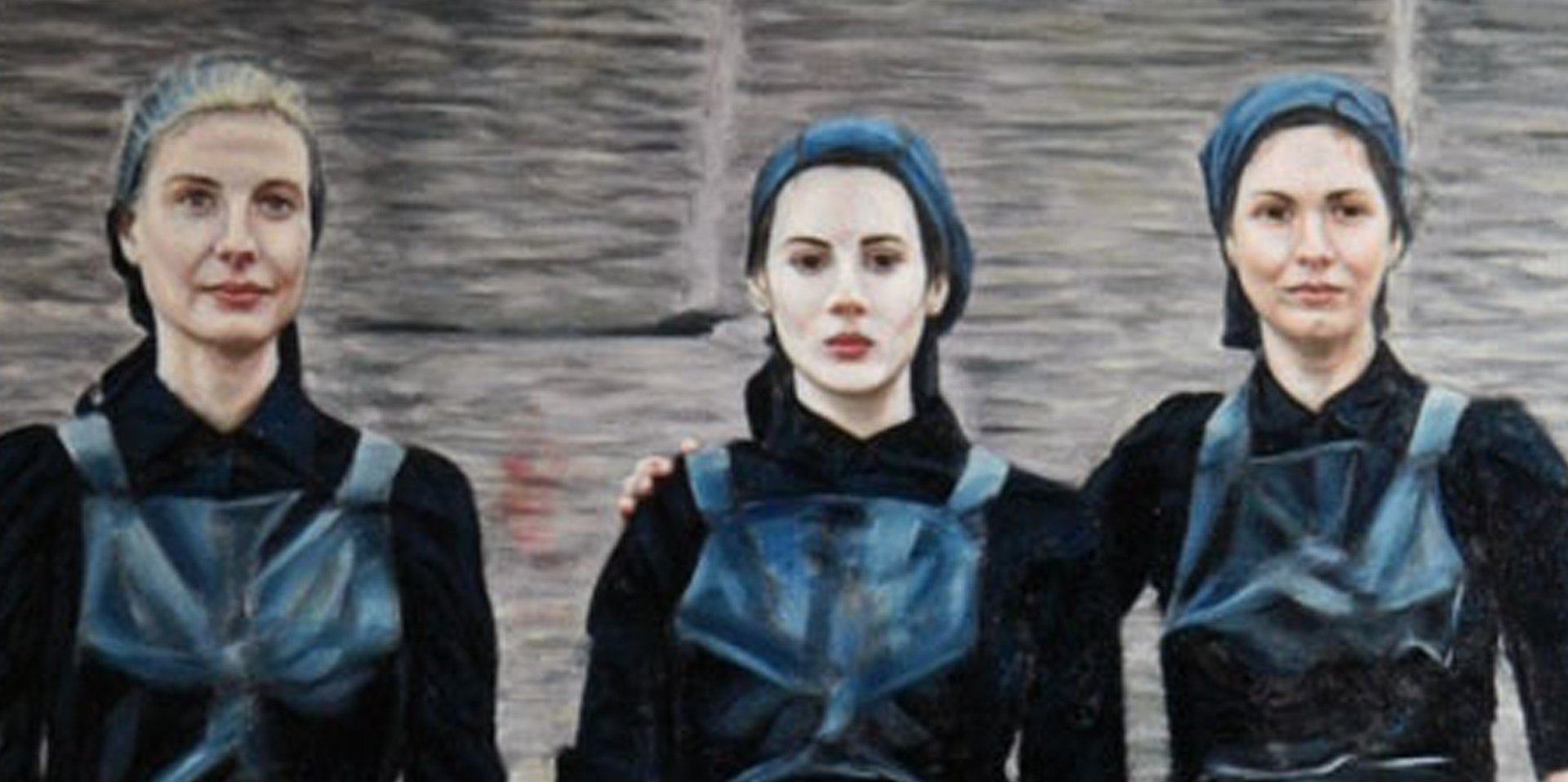 an abstract photo of a curved building with a blue sky in the background