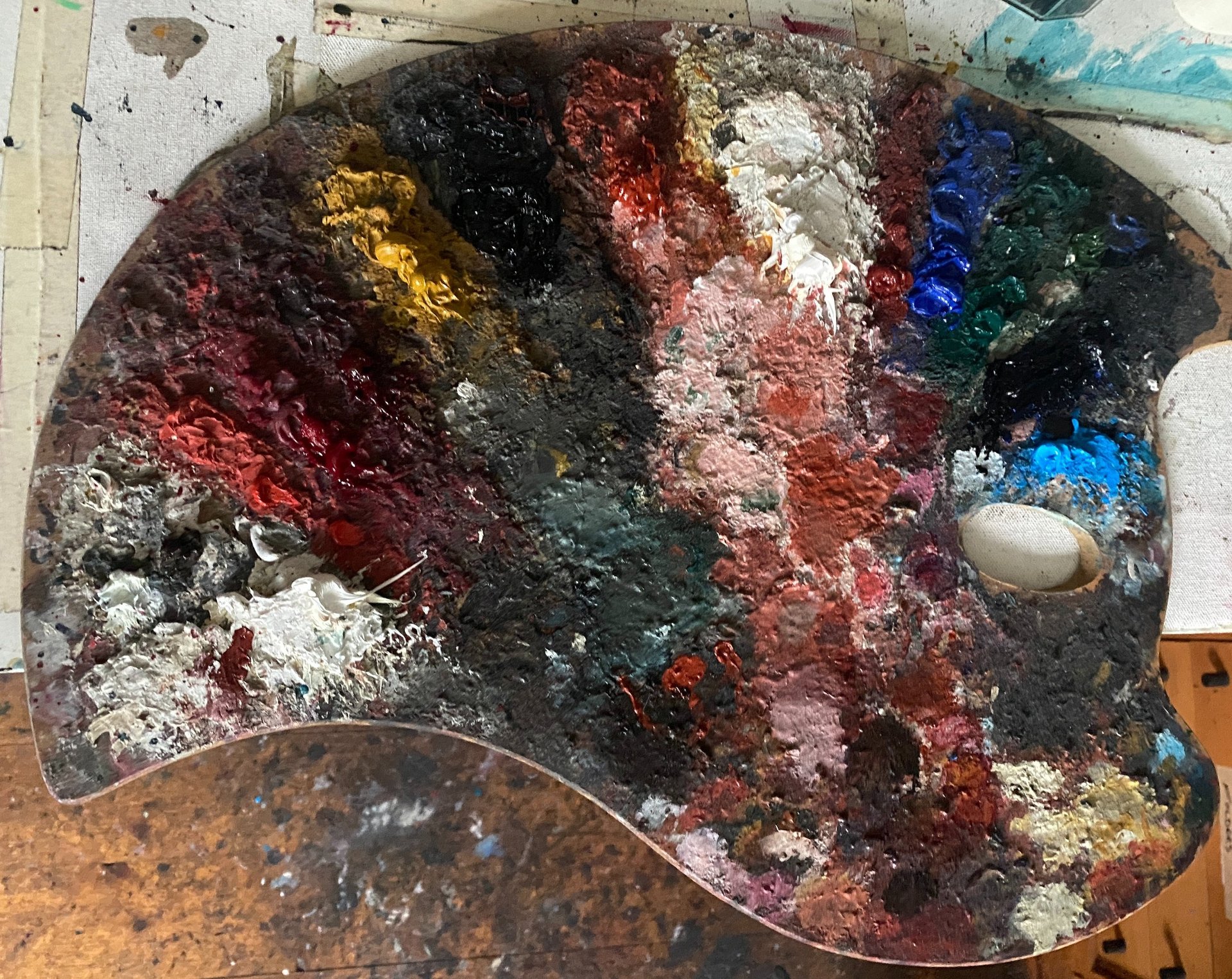 an abstract photo of a curved building with a blue sky in the background