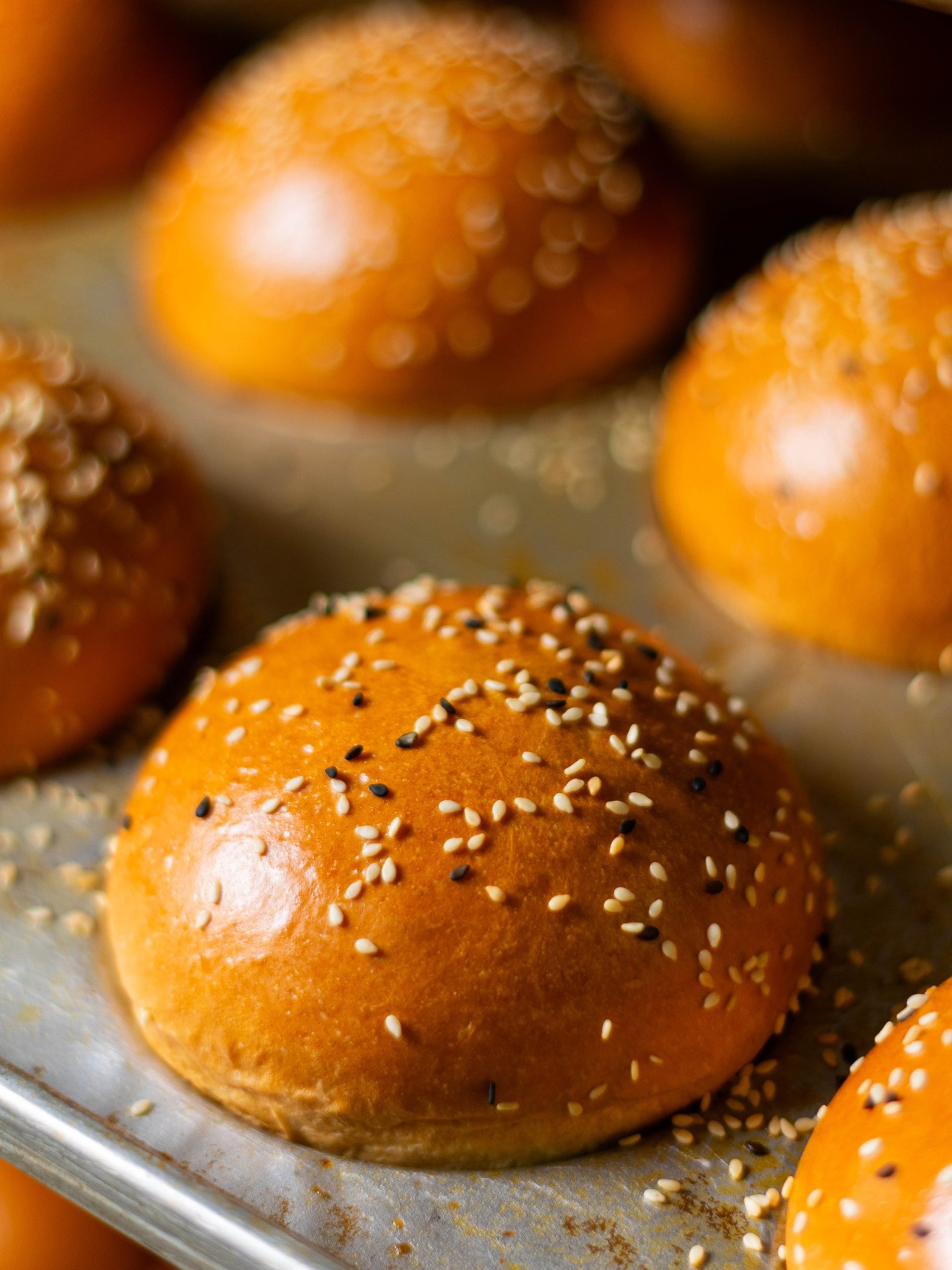 an abstract photo of a curved building with a blue sky in the background