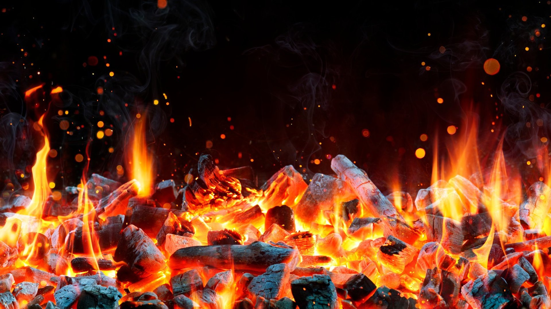 an abstract photo of a curved building with a blue sky in the background