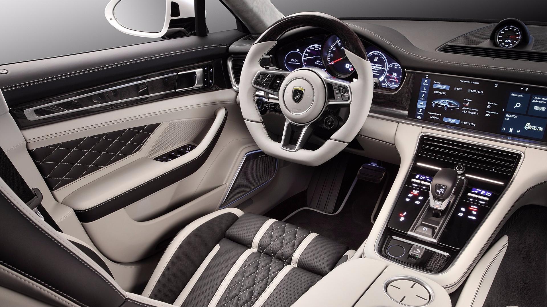the interior of a car with a steering wheel