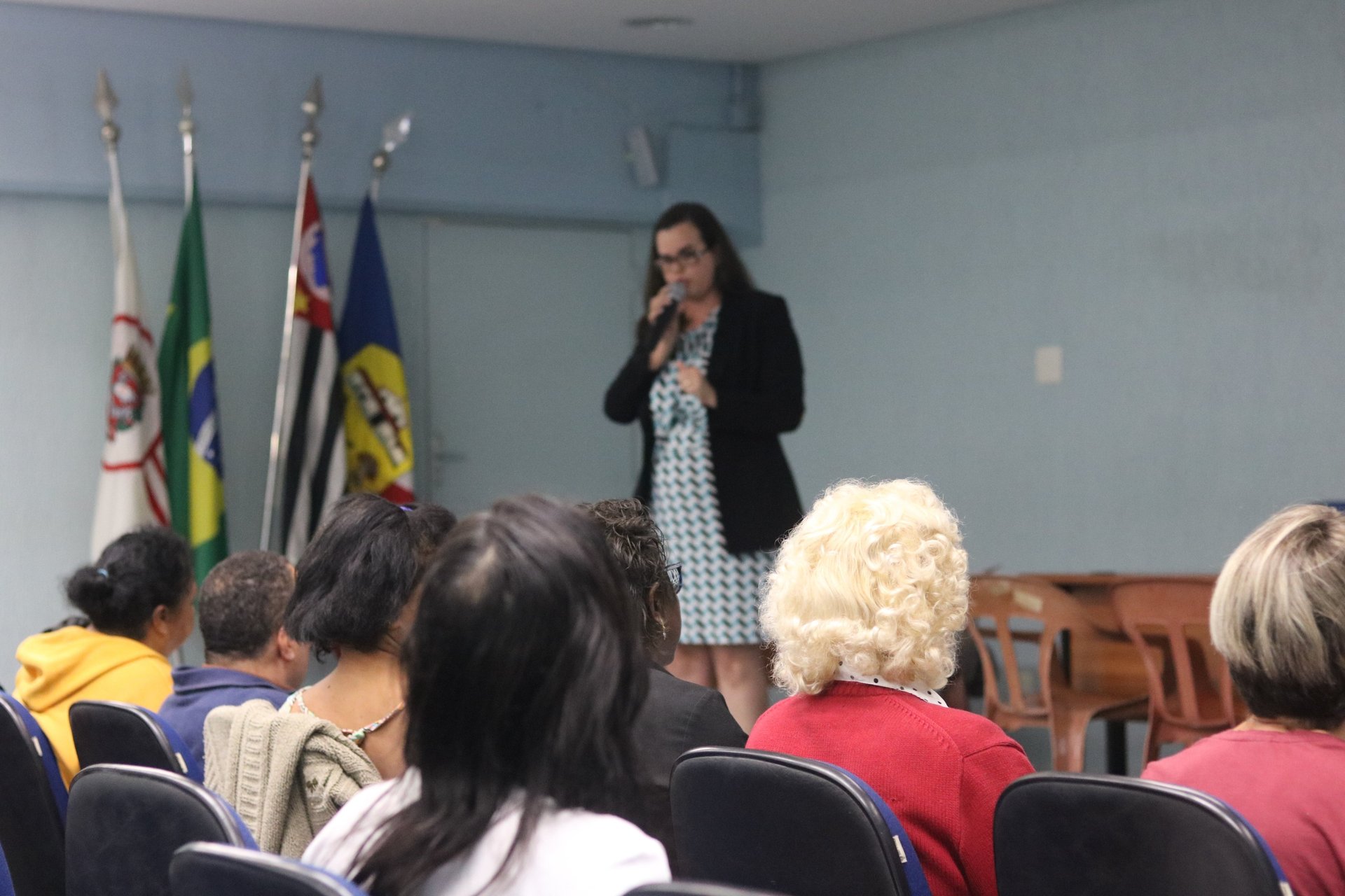 woman wearing yellow long-sleeved dress under white clouds and blue sky during daytime