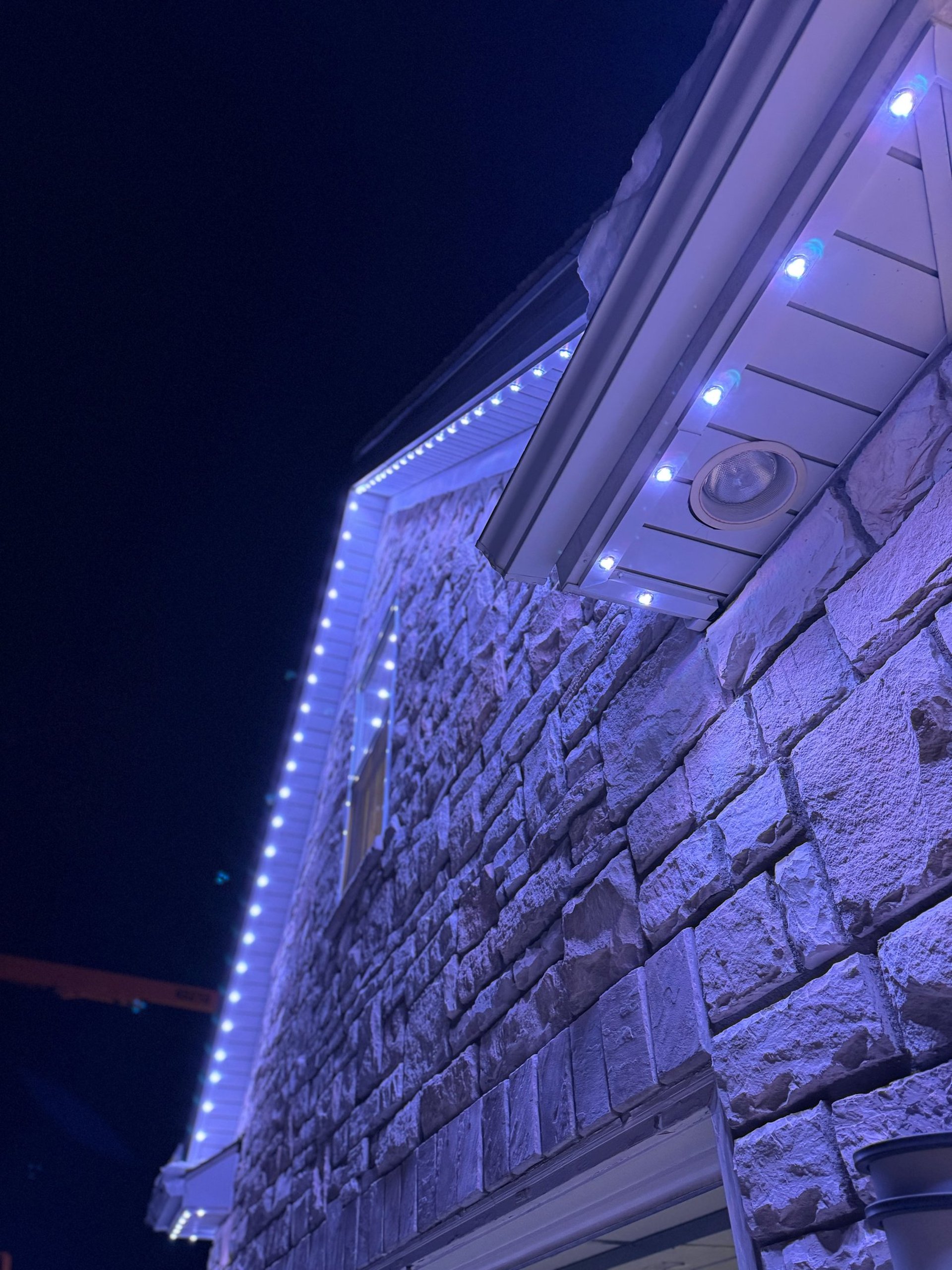 an abstract photo of a curved building with a blue sky in the background