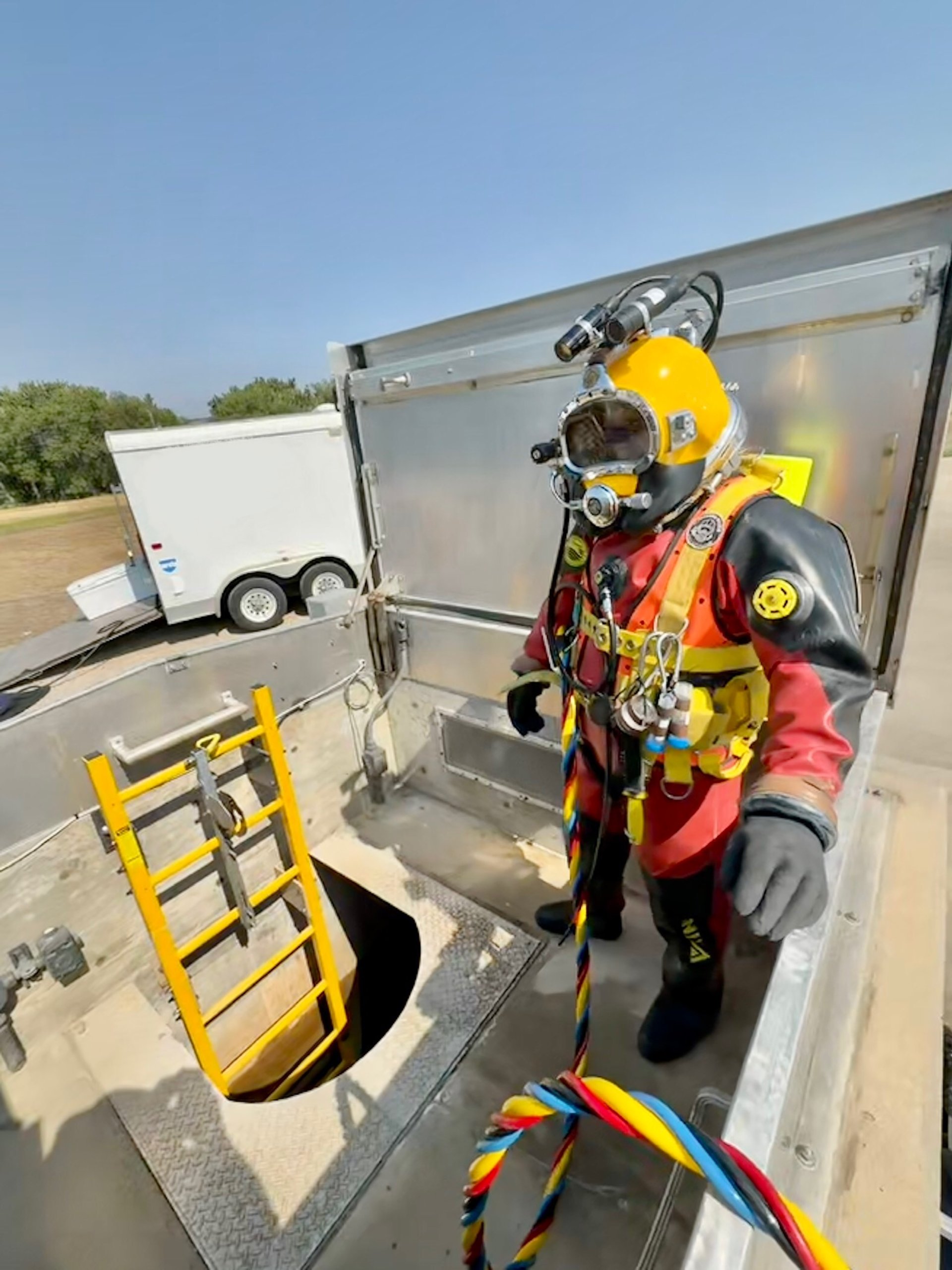 black and brown leather padded tub sofa