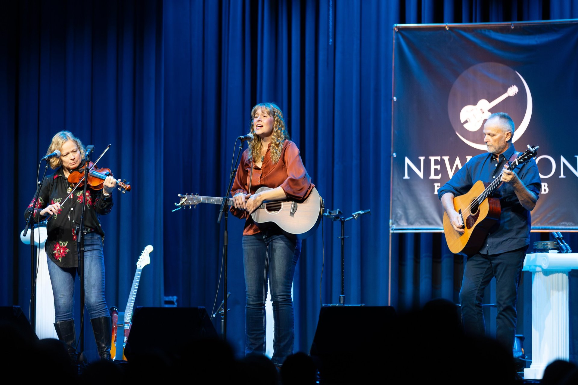 woman wearing yellow long-sleeved dress under white clouds and blue sky during daytime
