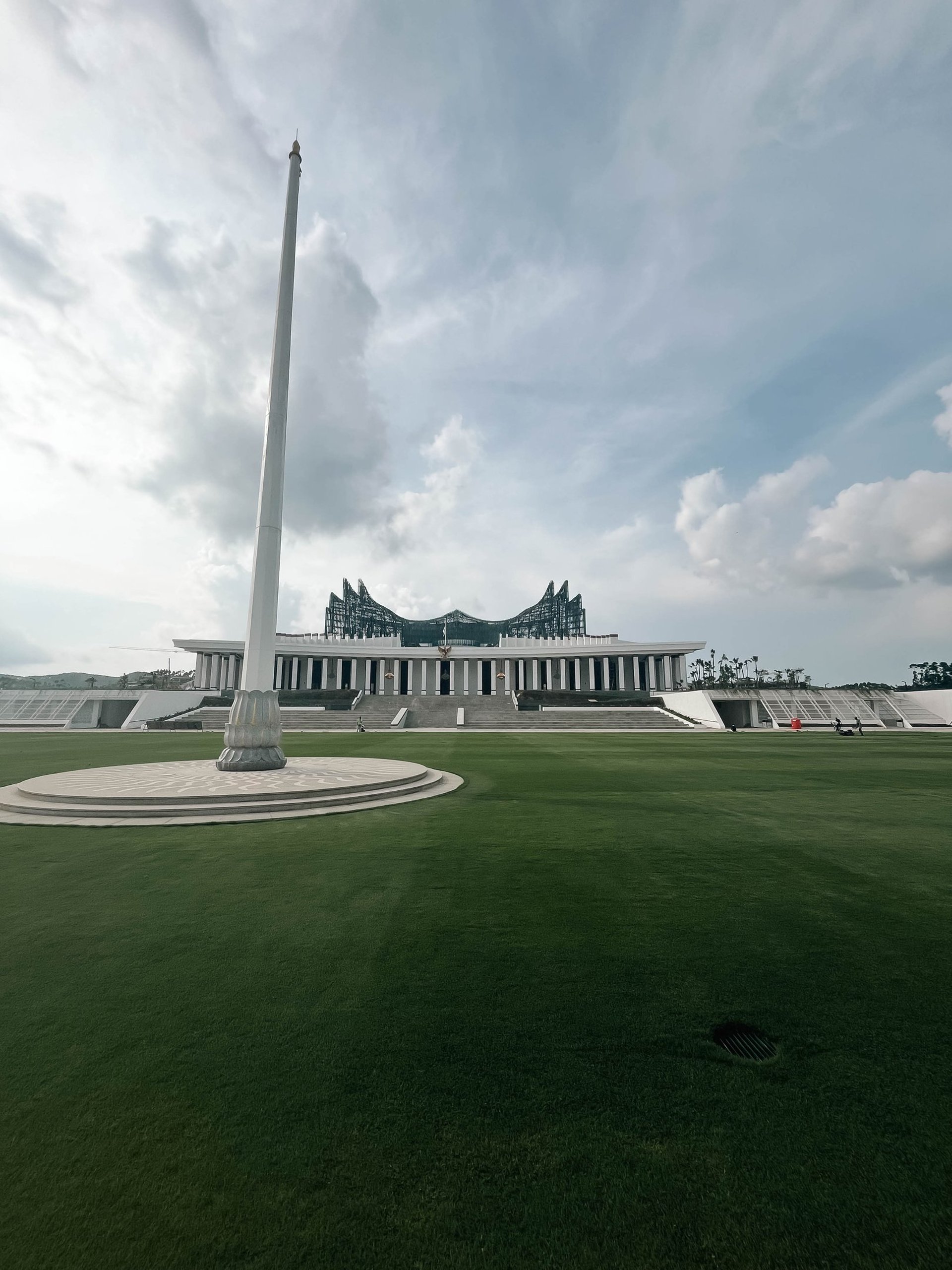 a building with a mountain in the background