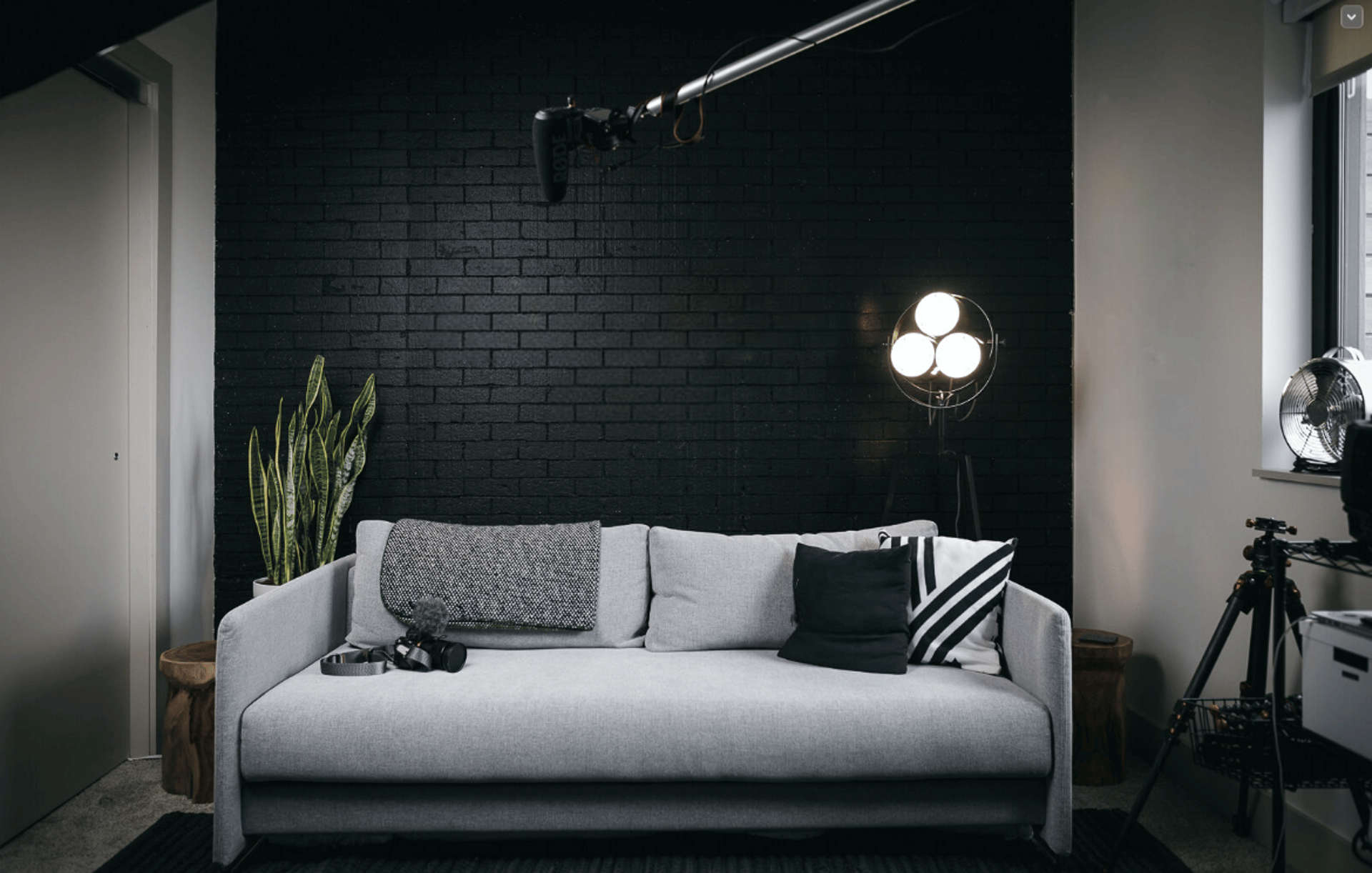 black and brown leather padded tub sofa