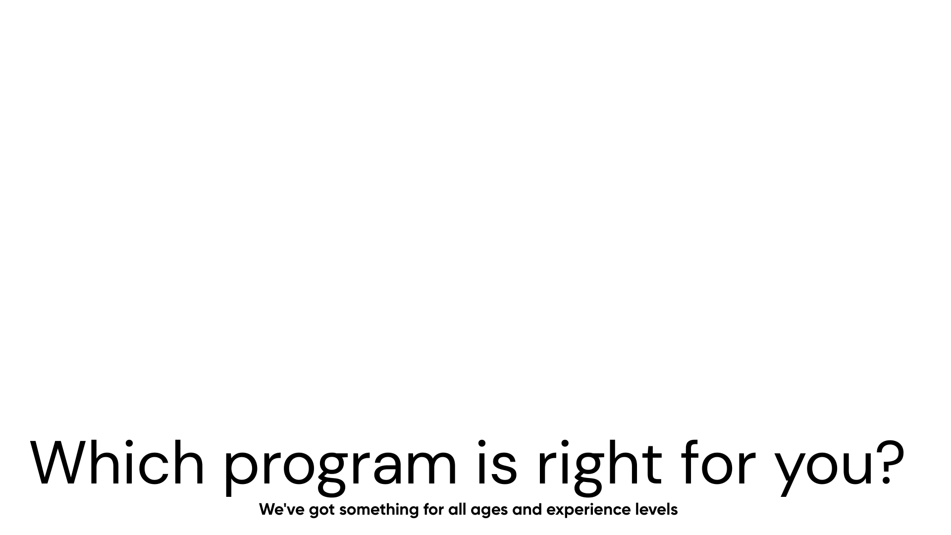 an abstract photo of a curved building with a blue sky in the background