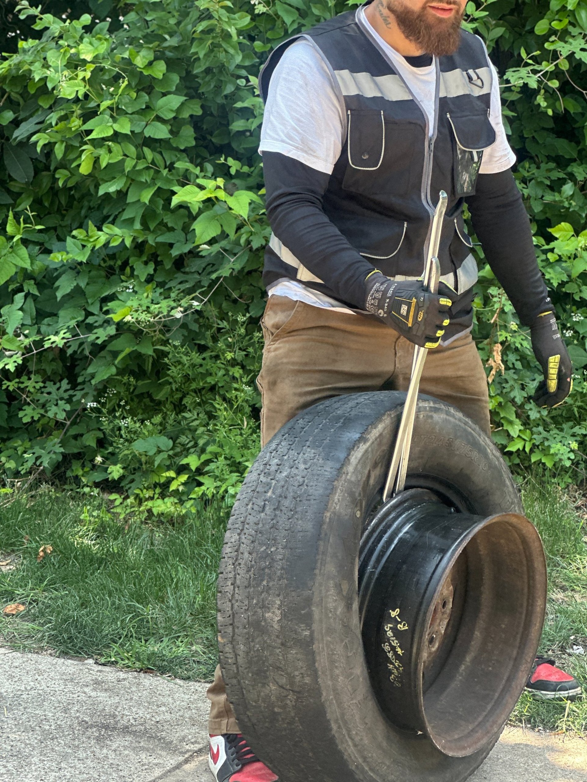 black car tire on gray concrete floor