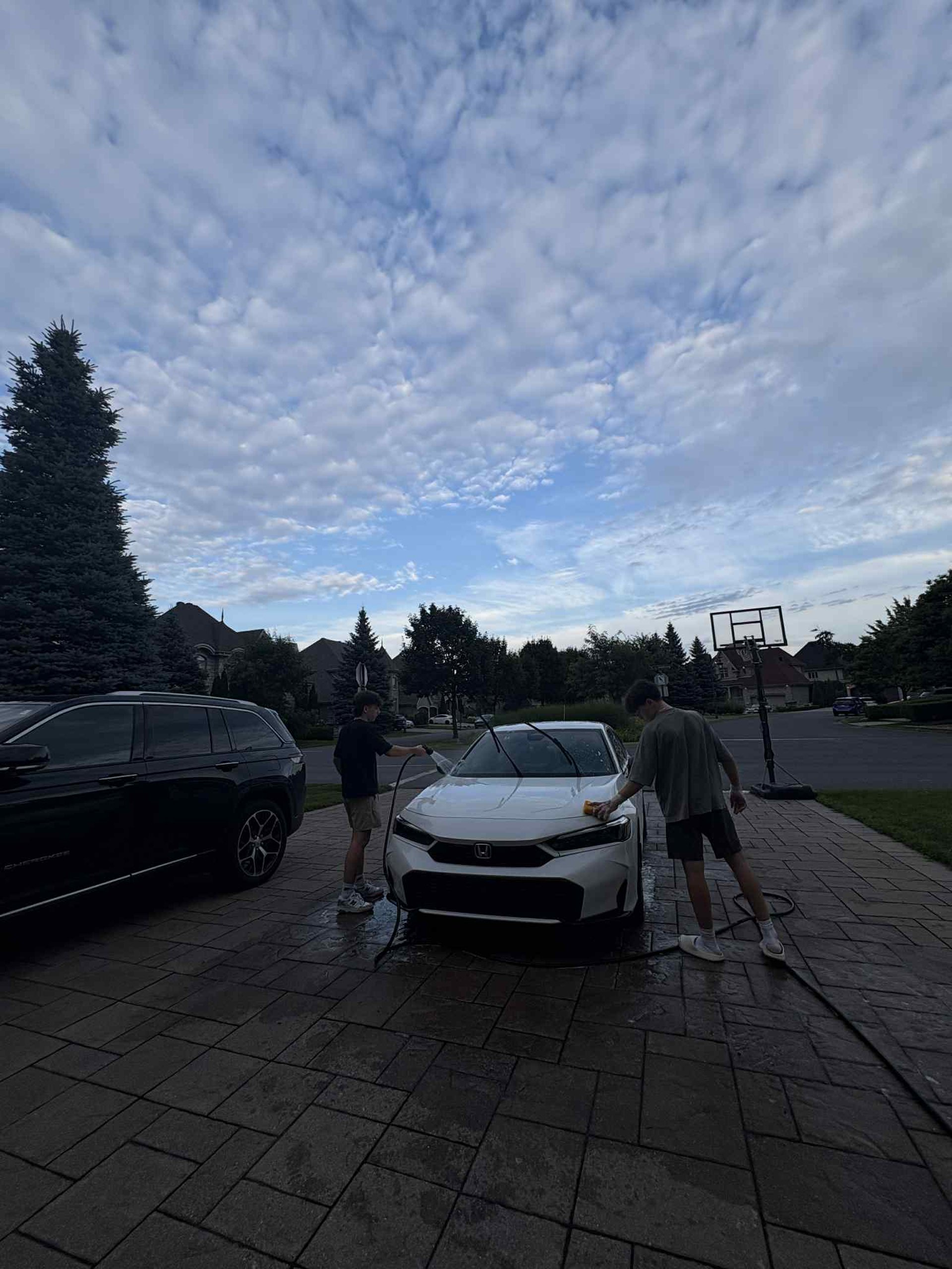 an abstract photo of a curved building with a blue sky in the background