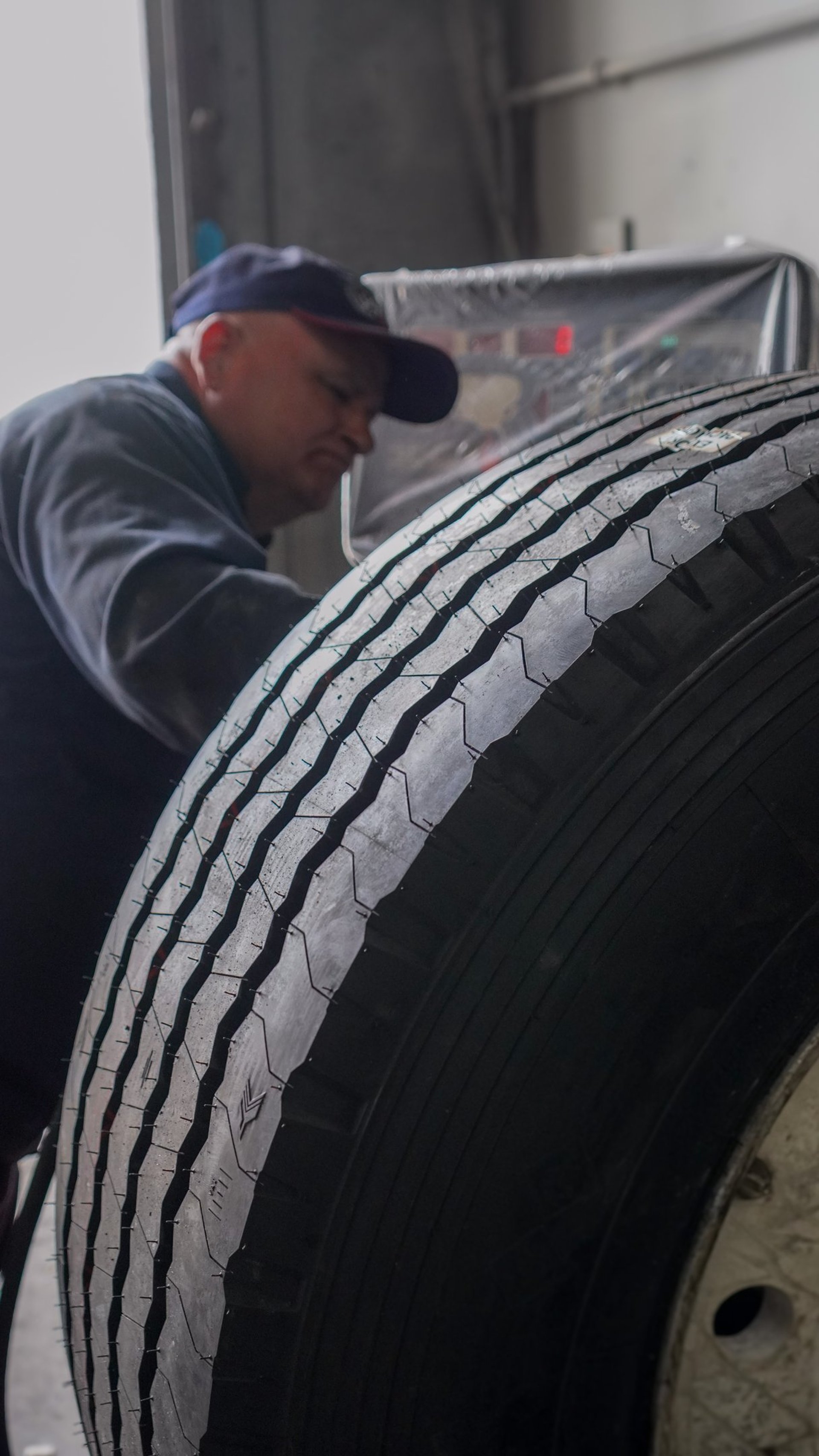 an abstract photo of a curved building with a blue sky in the background