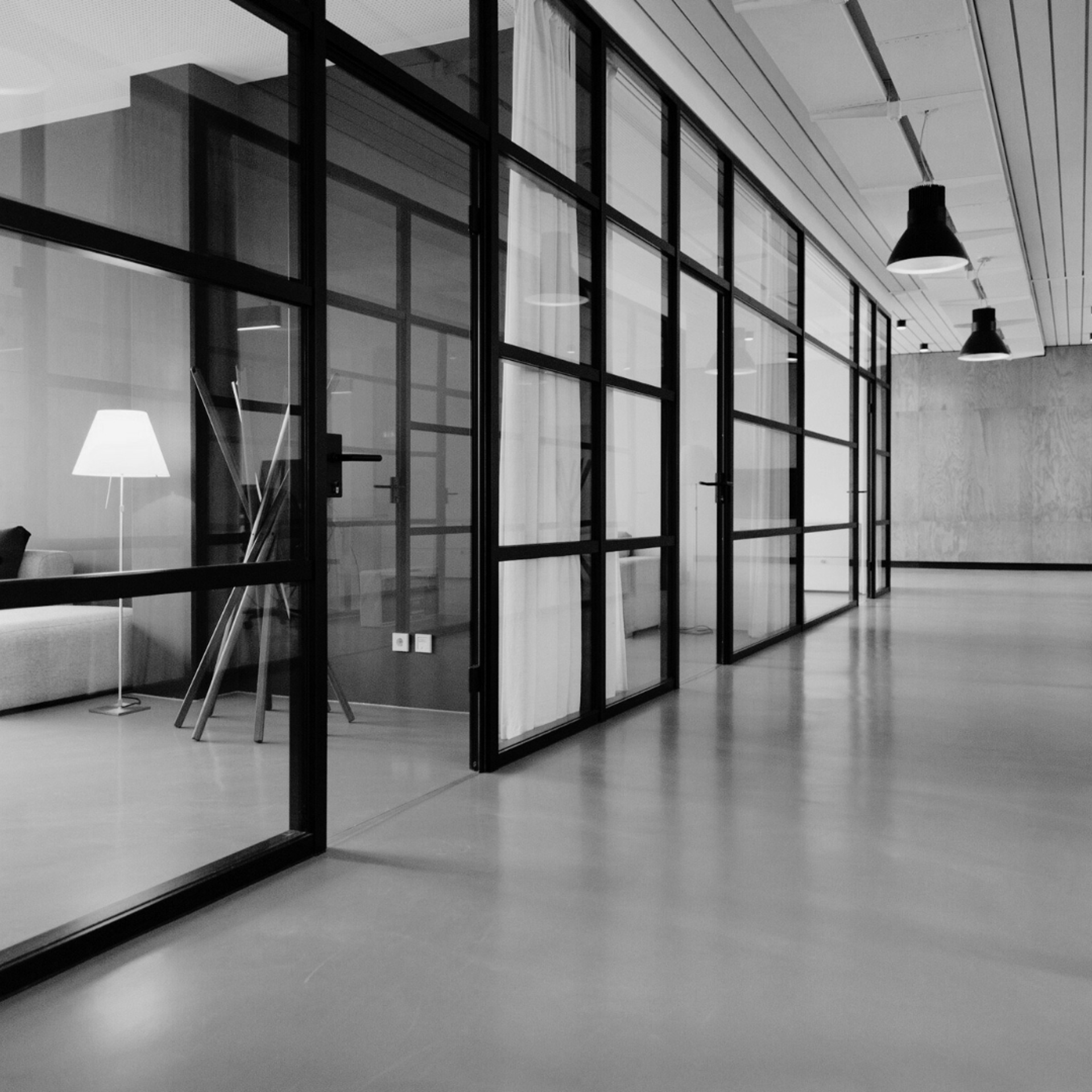 white sofa chair near fireplace