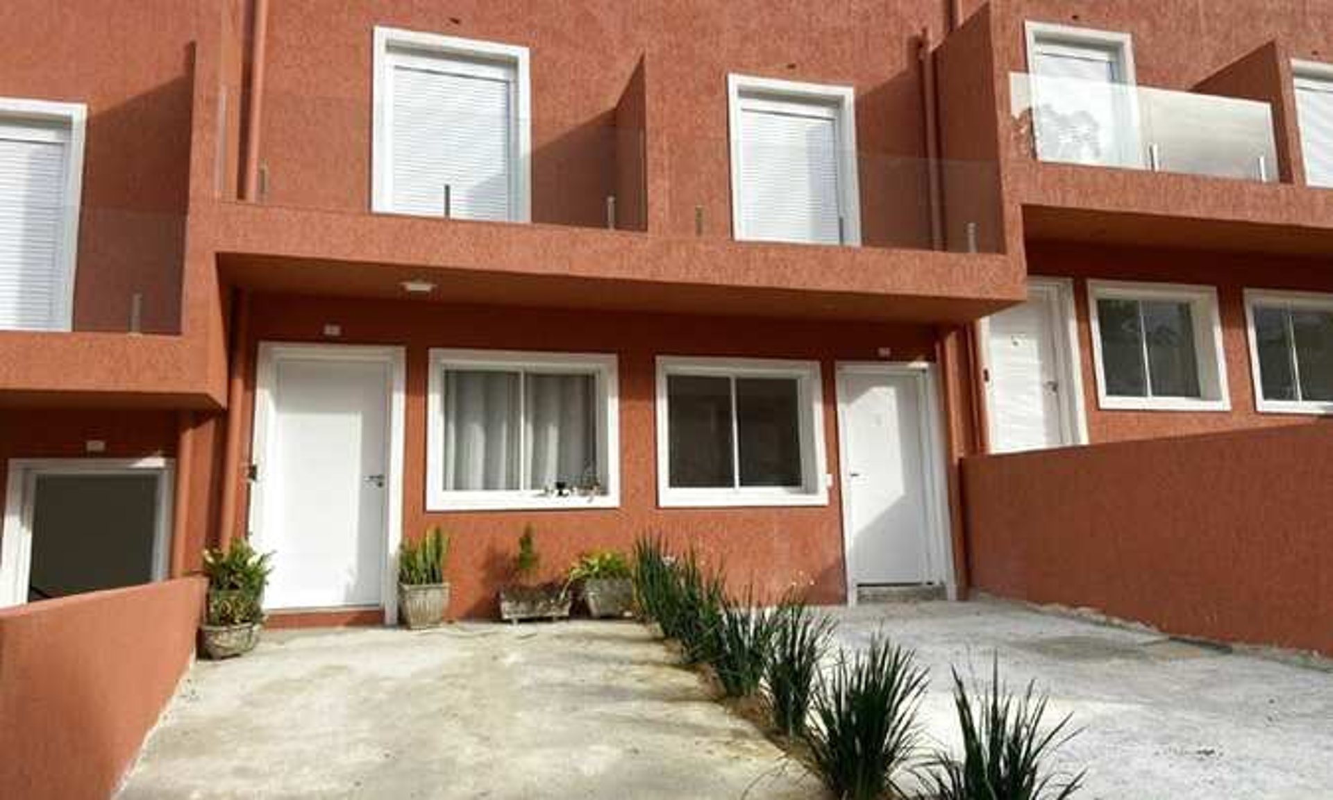 black and brown leather padded tub sofa