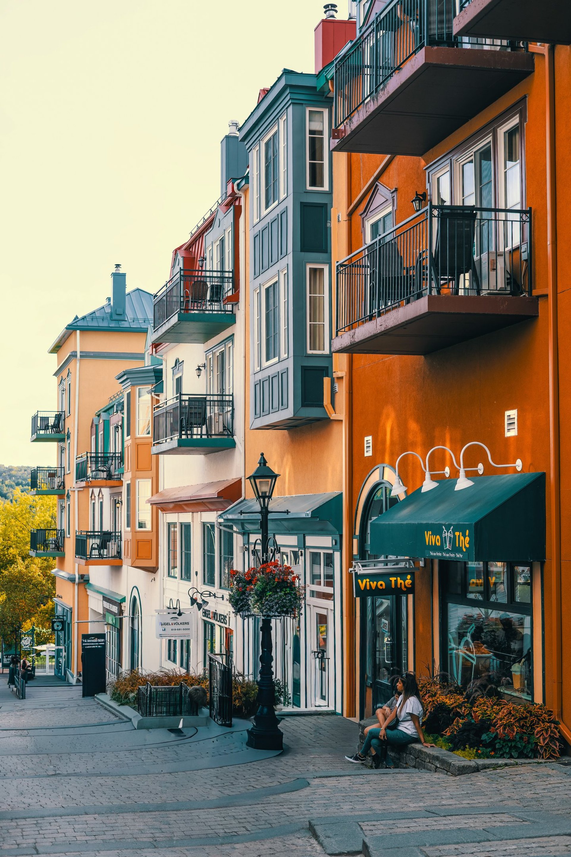 an abstract photo of a curved building with a blue sky in the background
