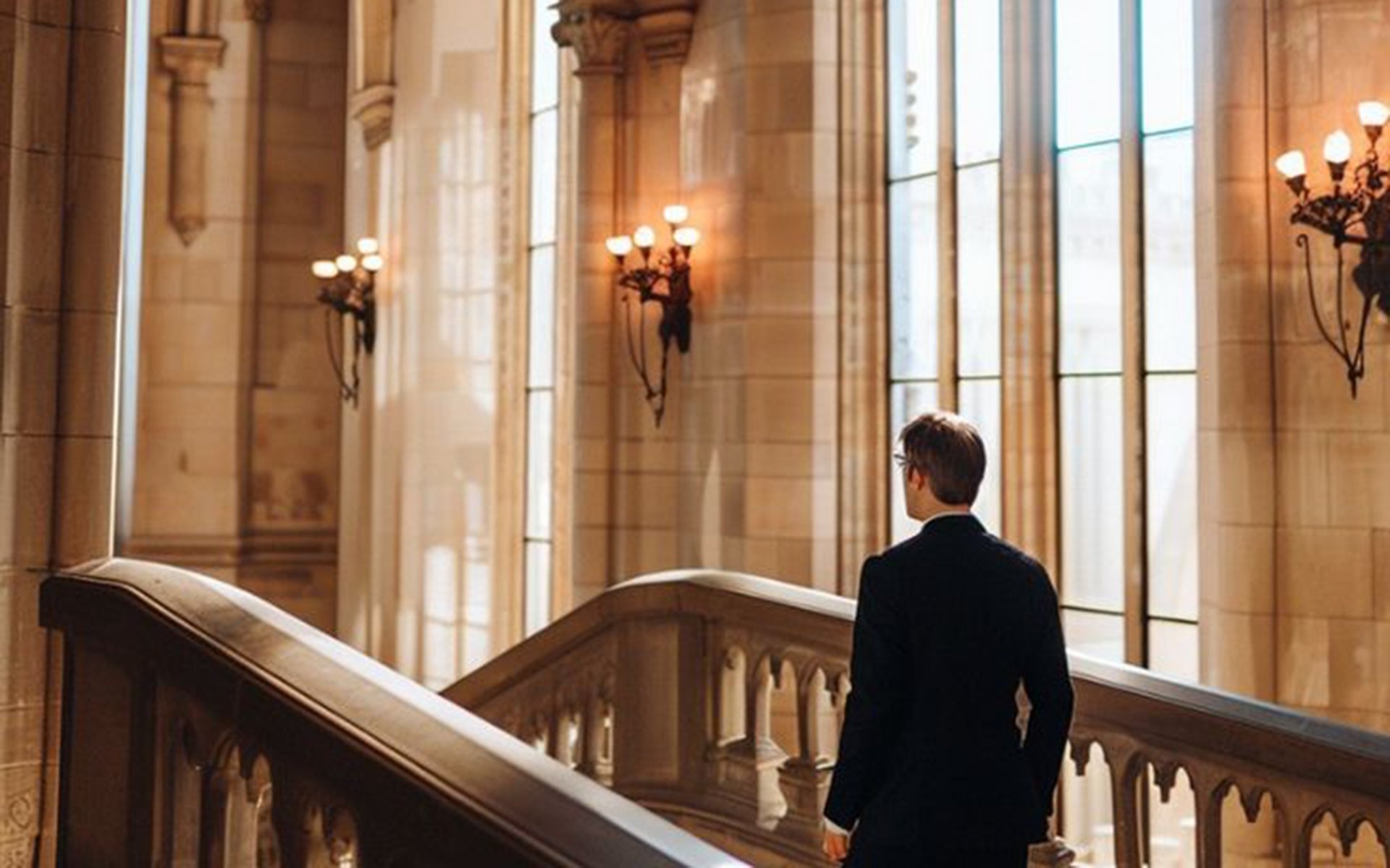 a couple of boats floating on top of a body of water