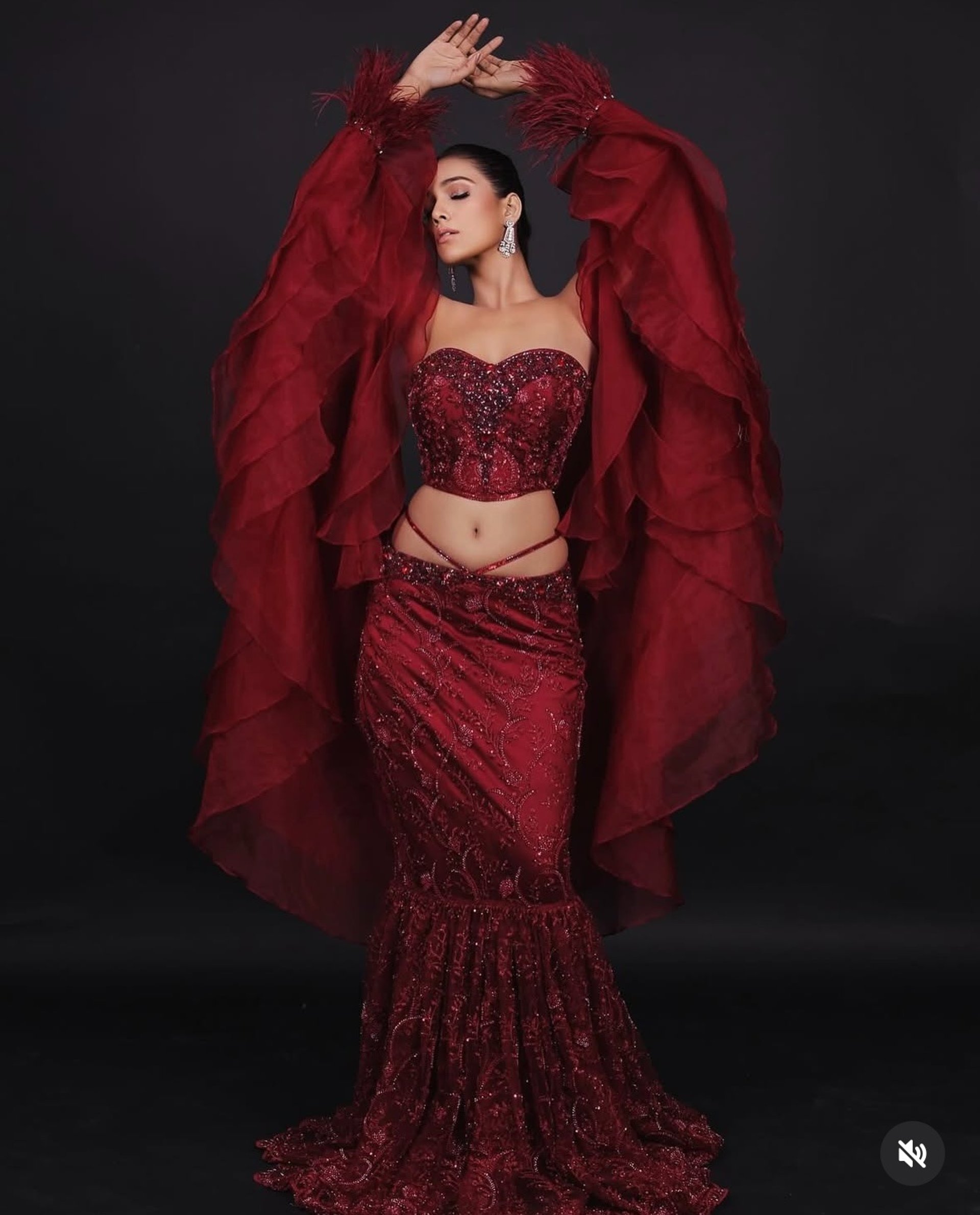 woman wearing yellow long-sleeved dress under white clouds and blue sky during daytime