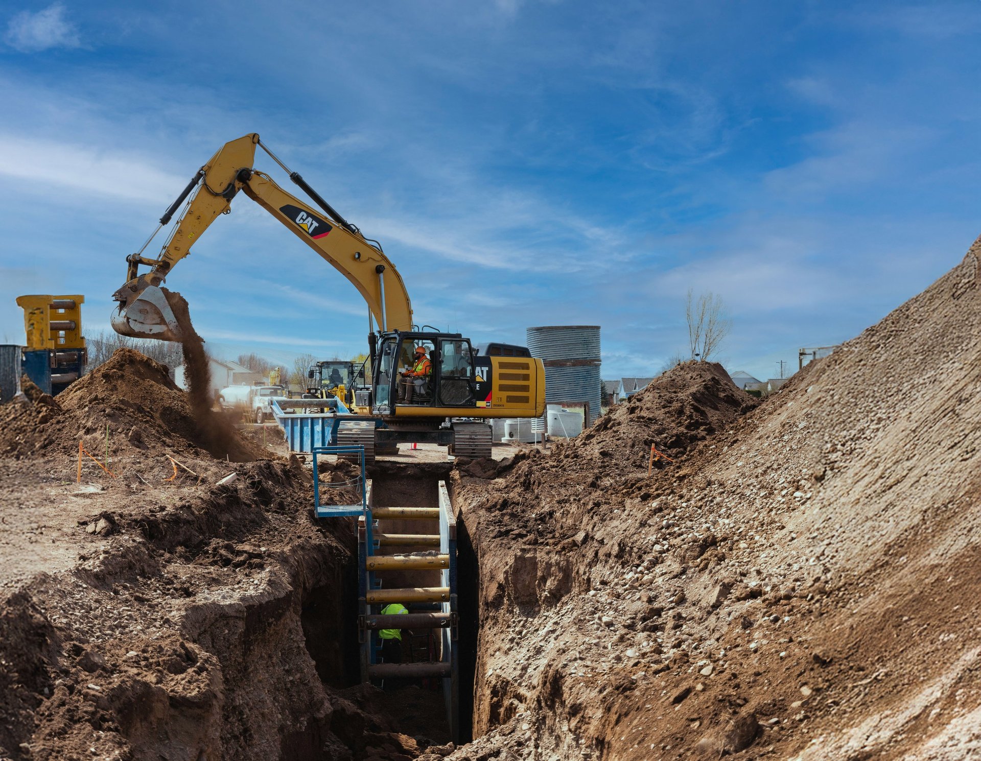 a construction vehicle in a dirt field