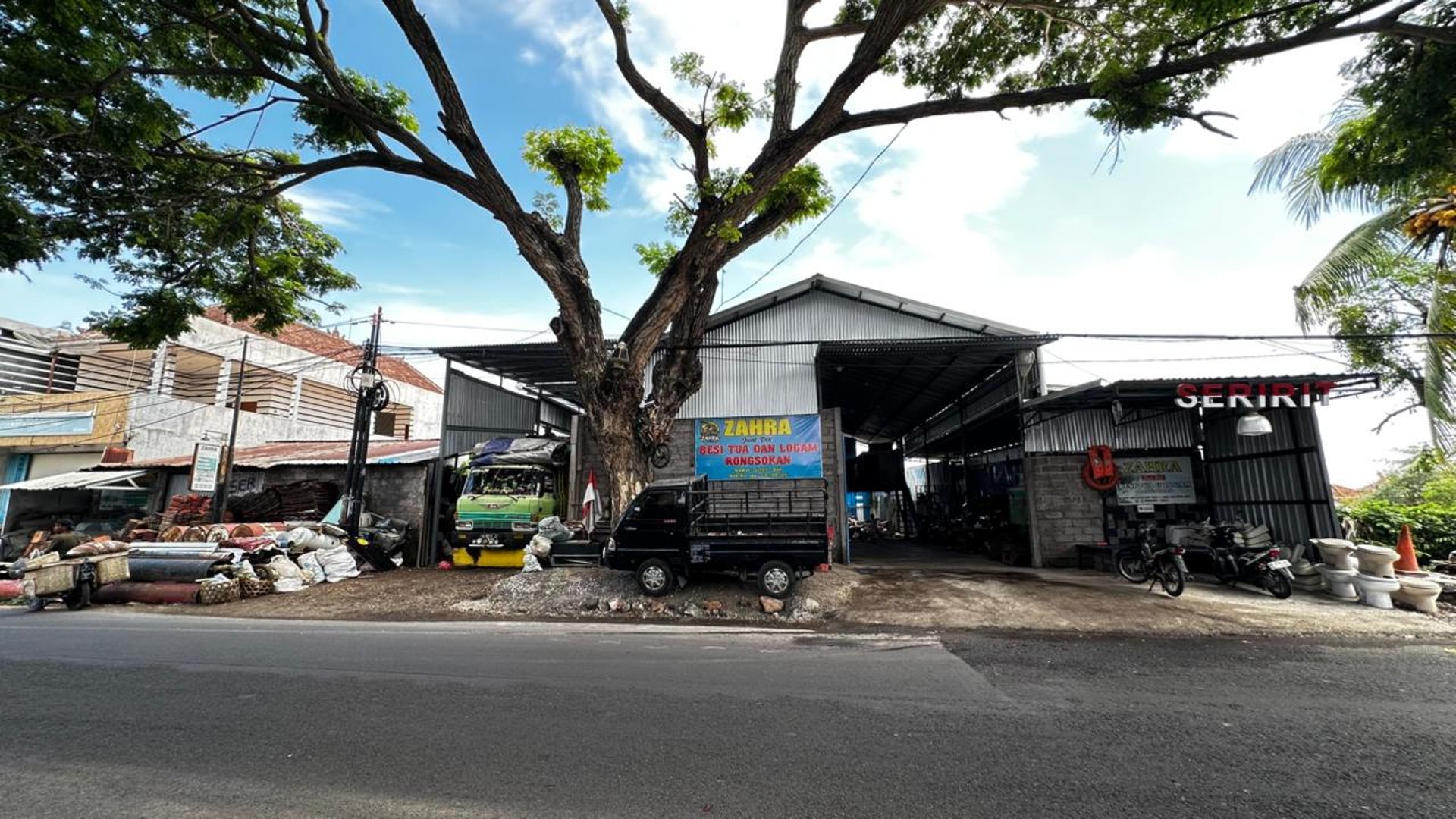 person wearing grey knit sweater