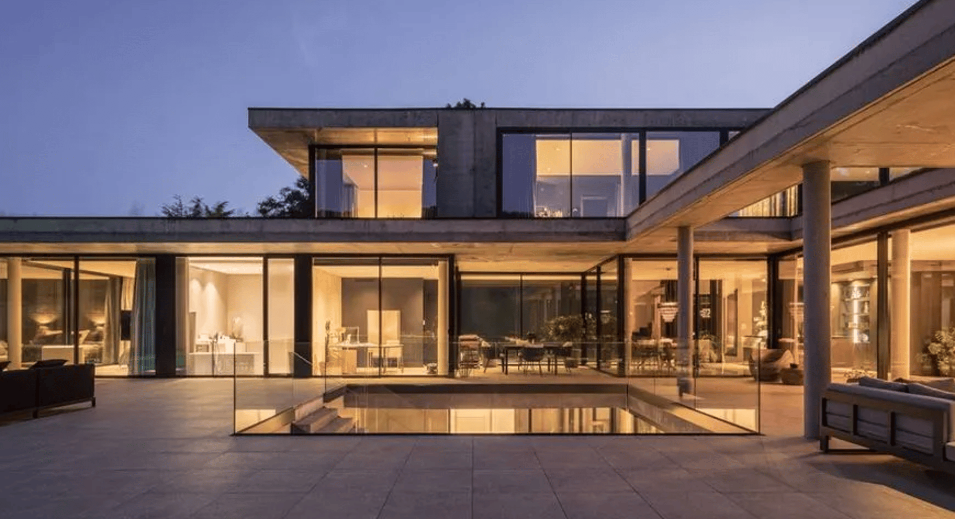 black and brown leather padded tub sofa