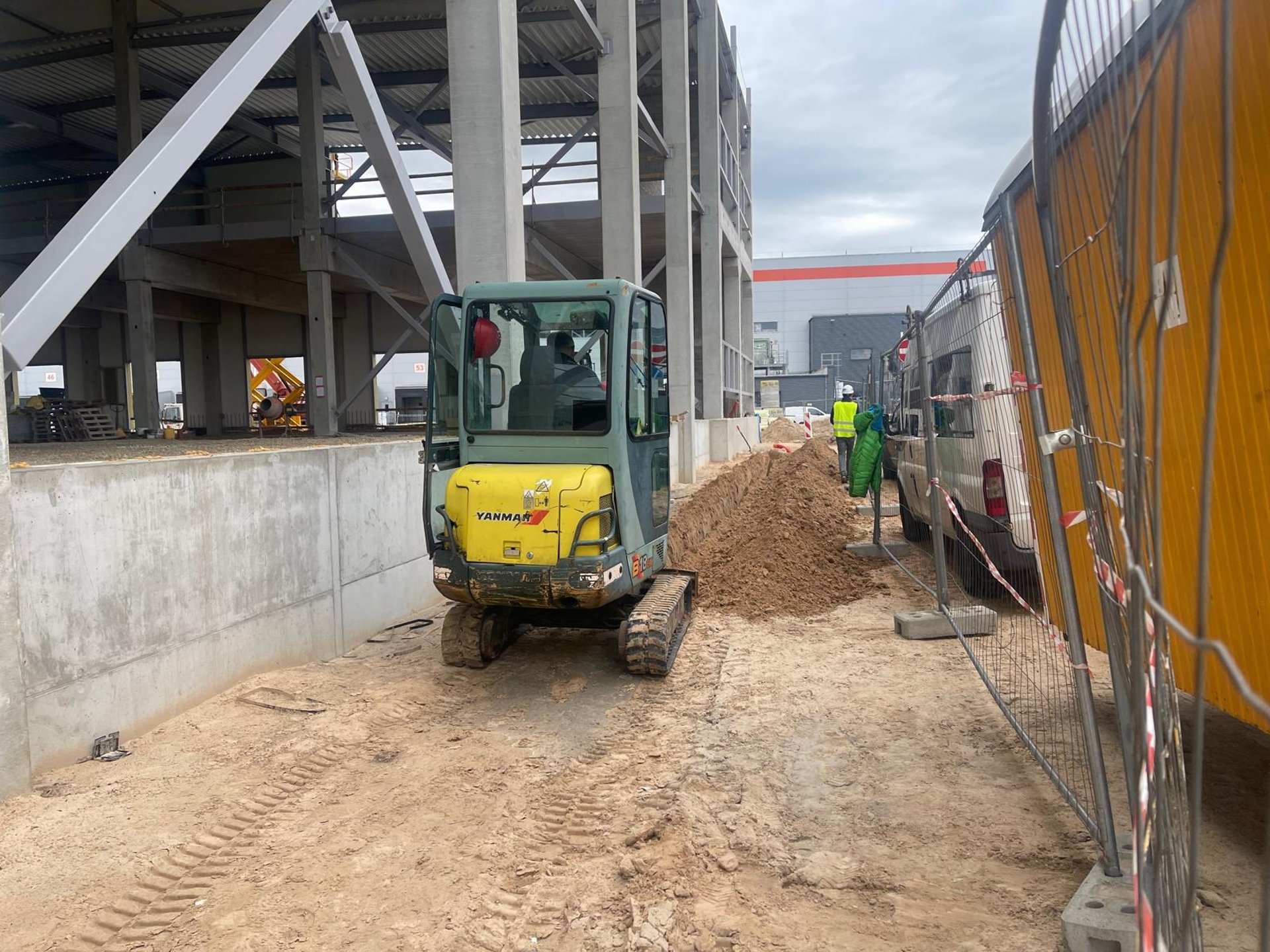 woman wearing yellow long-sleeved dress under white clouds and blue sky during daytime
