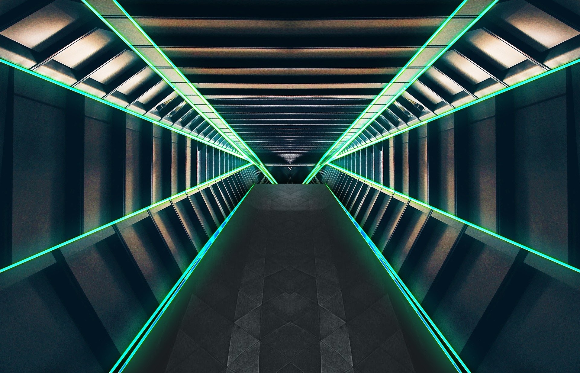 a subway station with a very colorful ceiling