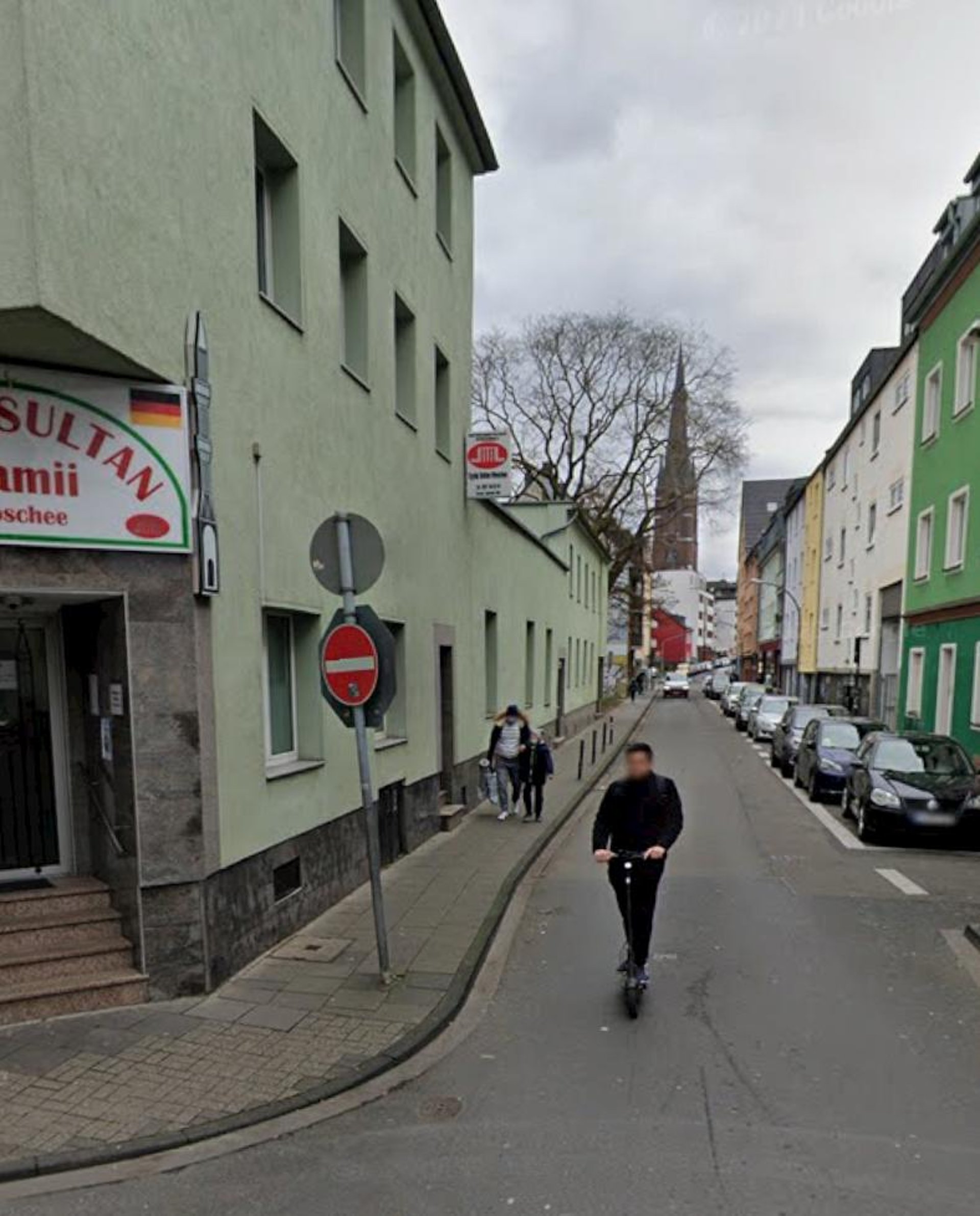 woman wearing yellow long-sleeved dress under white clouds and blue sky during daytime