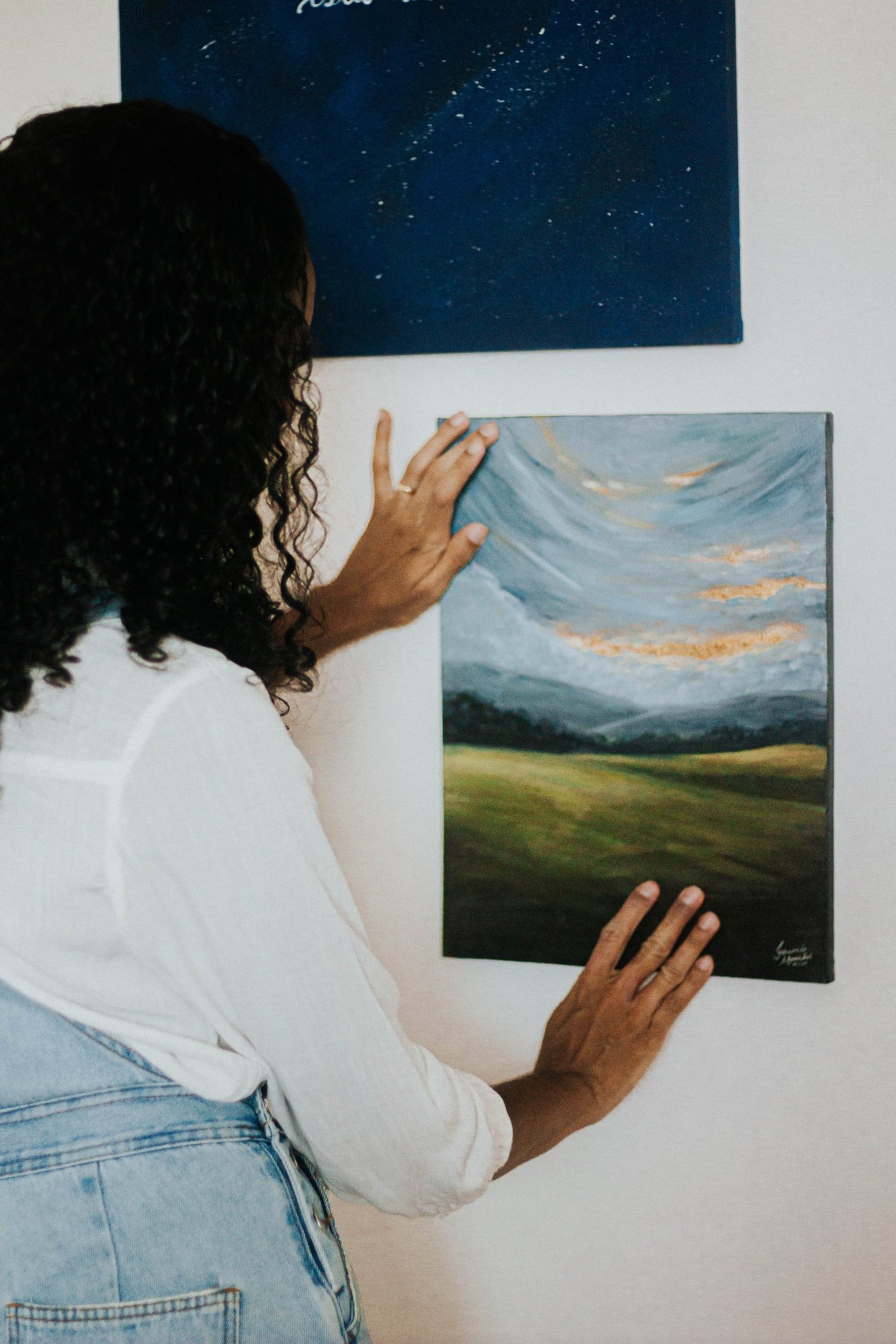 a close up of a black and brown abstract painting