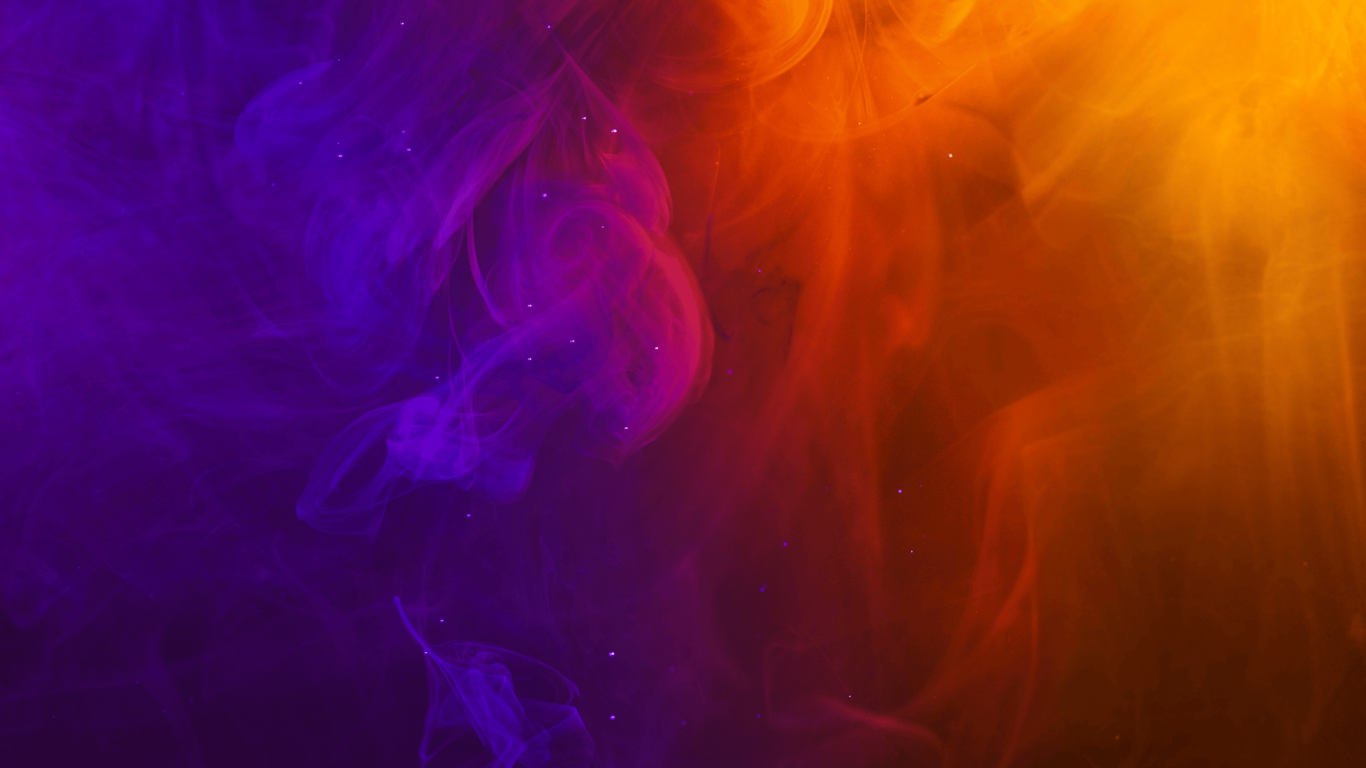 a blurry image of a blue and pink background