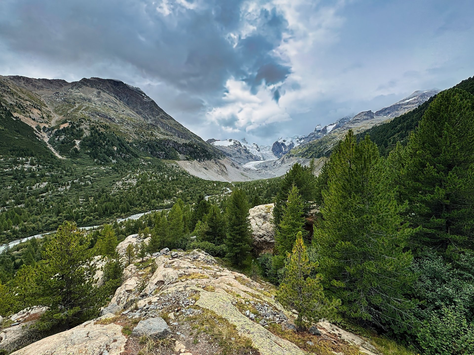 mountain near body of water during daytime