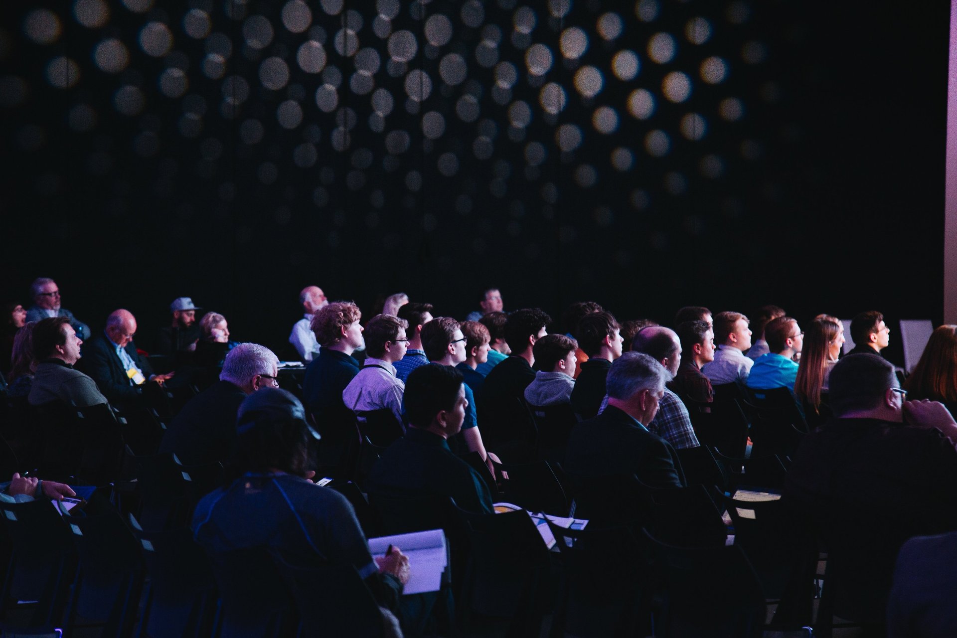 a group of people sitting in a room